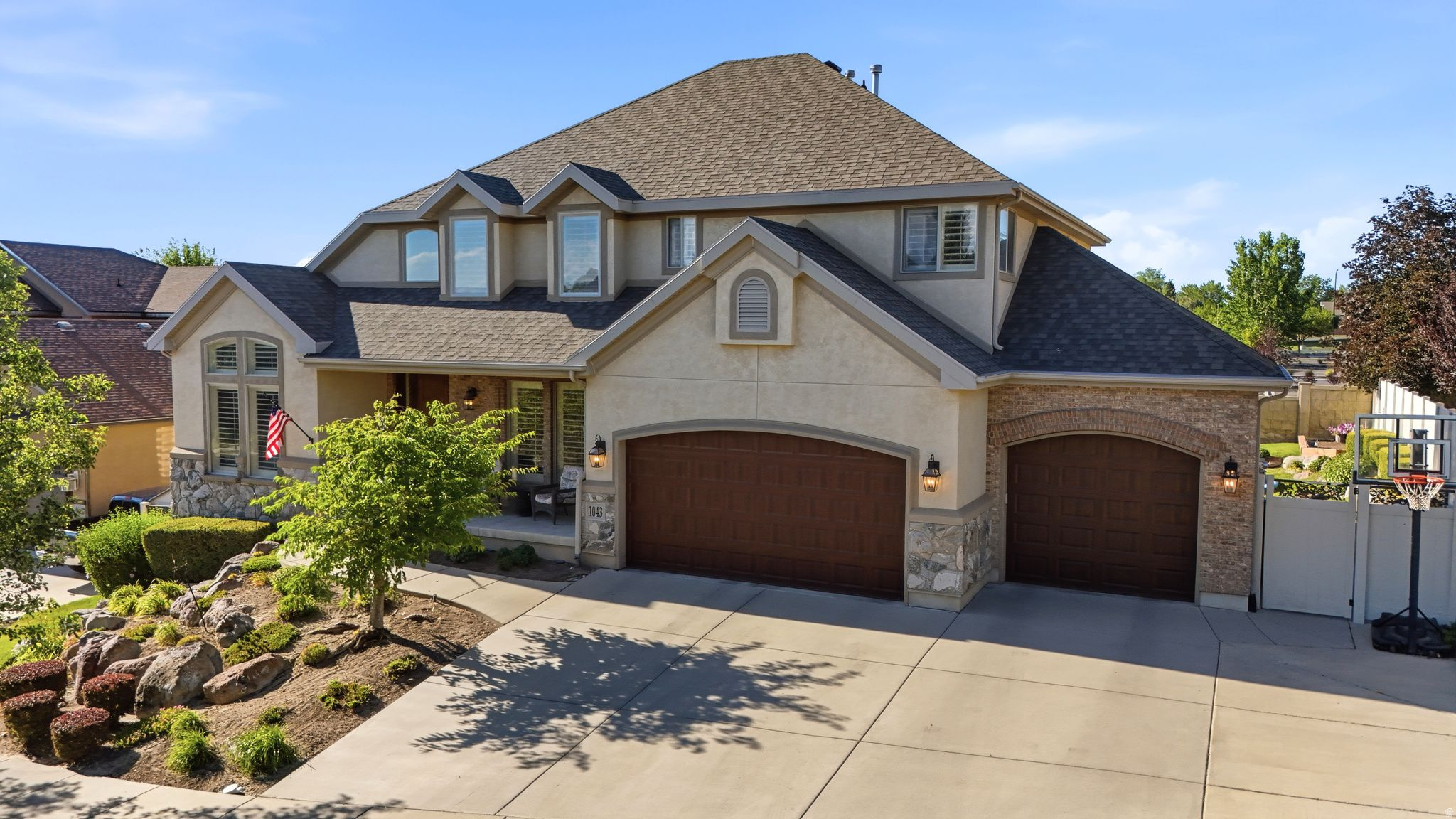 Nestled in one of Sandy's most desirable and established neighborhoods, this exceptional custom built home offers a thoughtfully designed living space with the perfect blend of luxury, comfort, and functionality. Ideally located just off 1000 East with quick access to freeways, you'll enjoy a peaceful, mature tree lined, super friendly community while remaining just minutes from multiple grocery stores, endless restaurants, schools, hiking and biking trails, a nearby park walking distance from your front door, and everything Salt Lake Valley has to offer. Featuring 7 spacious bedrooms, 4 bathrooms, and an incredibly versatile floor plan, this home is perfectly suited for families, entertaining, or multi generational living. The fully finished basement includes a second kitchen, expansive living areas, and abundant storage, including a dedicated oversized cold storage room plus three additional storage closets throughout, plus extra rooms that could be used for bedrooms or for a dedicated gym room/ theatre room. The oversized 3 car garage with EV charging provides extra room for vehicles, toys, and workspace, while dedicated RV parking offers even more flexibility for your outdoor lifestyle. Step outside to your own private backyard retreat featuring mature trees, no rear neighbors, breathtaking mountain views, and a covered patio perfect for year round entertaining. Unwind after a long day in the included hot tub while enjoying the peace and privacy this remarkable property provides. The thoughtfully designed main level features a welcoming formal sitting room, a dedicated home office, and a spacious guest bedroom conveniently located next to a full bathroom. Not to mention all appliances are included in the large open style kitchen! Two inviting fireplaces create warm, elegant living spaces on both levels, while the expansive floor plan offers the perfect balance of comfort for everyday living and sophistication for entertaining family and friends. Opportunities to own a home of this size, quality, and location in Sandy are truly rare. Schedule your private tour today!