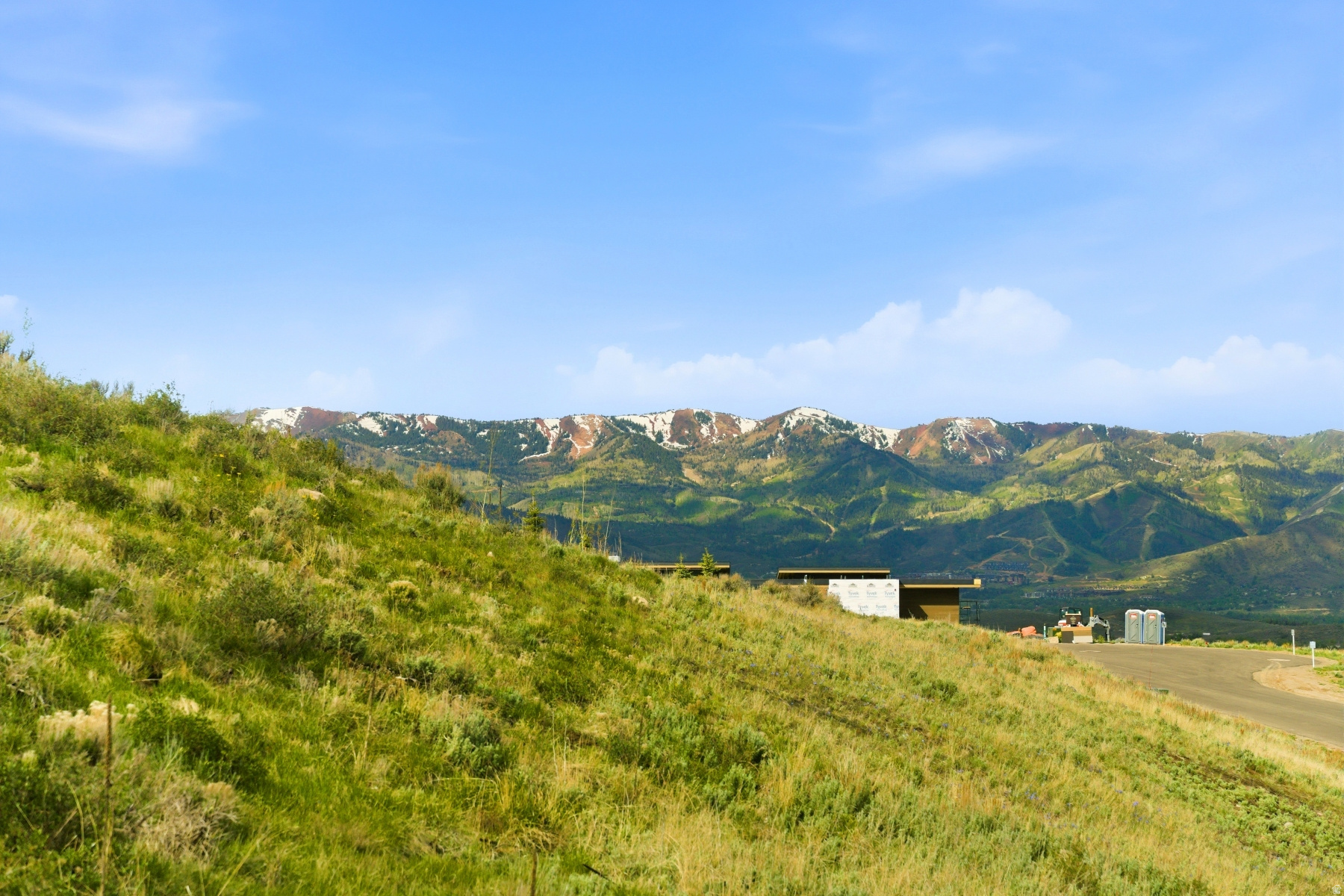 Coveted Elk Ridge Bluffs Homesite -- Positioned along one of the most coveted streets within Promontory Club, this exceptional homesite on Bugle Trail presents a rare opportunity to capture sweeping views of the Wasatch Back, including the iconic ski runs of Park City Mountain. Located in a more recently released enclave within Promontory Club, this homesite is framed by striking new construction and architecturally significant homes, creating an elevated setting defined by design and privacy. Encompassing over 1.5 acres, the homesite features a generous building envelope that allows for thoughtful design flexibility. The natural terrain lends itself beautifully to a multi-level mountain retreat, with ample space to create seamless indoor-outdoor living environments that embrace the surrounding landscape and expansive vistas. Ideally oriented to take full advantage of panoramic views in multiple directions, this lot provides a compelling canvas for a custom estate designed to maximize light, privacy, and year-round enjoyment. Its setting offers a sense of seclusion while remaining conveniently close to Promontory's renowned collection of amenities, from championship golf and private ski access to dining, wellness, and family-focused experiences. A Full Golf Membership is available, offering immediate access to the elevated lifestyle that defines Promontory Club. This is a rare opportunity to build a legacy property in one of Park City's most prestigious gated communities-where exceptional views, thoughtful design, and unmatched lifestyle converge.