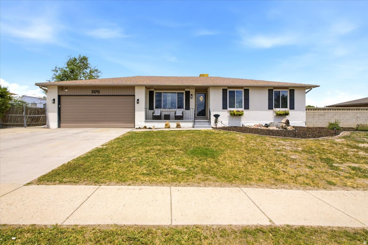 Take a look at this stunning West Jordan home! A timeless all-brick rambler, with tasteful modern upgrades. This home is CLEAN and has been so loved and well-maintained! Step inside and you will be welcomed with modern bookcases and large windows for an elegant front room or office. The open kitchen has been upgraded with quartz and wood countertops, and plenty of storage. All kitchen appliances are included! Right off the kitchen is a bonus area or family room that could also be used as a formal dining room. Downstairs offers a large family room, storage room, two bathrooms, one bedroom, and an exercise room that could be converted to a 5th bedroom. There is also potential to make the basement into an apartment or mother-in-law if you would like to "house-hack"! Outside there is RV parking, a large shed for storage, a huge stained concrete patio, and artificial turf for easy maintenance. The backyard is perfect for entertaining and having fun! And don't forget the garden boxes with an already established garden. This home truly has it all! Sq.Ft. per county records. Buyer to verify all info.