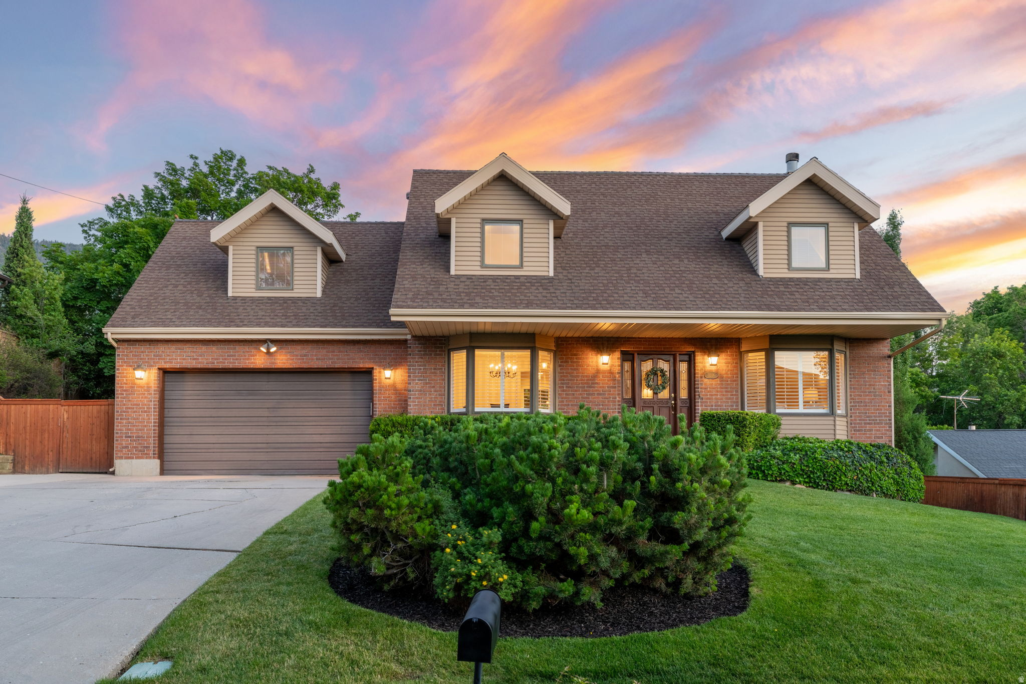 Tucked into a quiet cul-de-sac high on the east bench sits this classic all-brick charmer.  Spend time relaxing in your perfectly private backyard while enjoying glorious views of Mt. Olympus. High-quality updated kitchen with stone countertops. Real hardwood floors throughout the main floor, Brand new carpet, and fresh paint! Vaulted ceilings and dormer windows in each bedroom bring in generous amounts of natural light. This is a special place that you'd be lucky to call home!