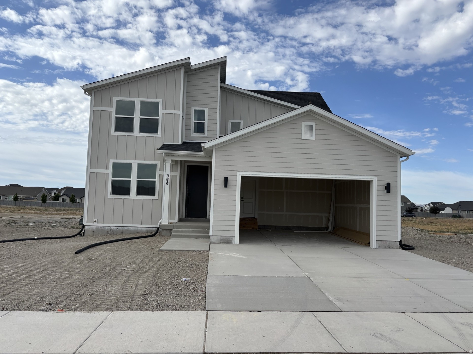 This beautifully designed Lassen floor plan in Pinnacles Reserve offers 4 bedrooms, 2.5 bathrooms, a main-floor study, and a 2-bay garage on a 0.20-acre lot. The open-concept layout creates a seamless flow between the kitchen, dining area, and great room, making it ideal for both everyday living and entertaining. The kitchen is thoughtfully designed with white cabinetry, and quartz countertops. A cozy fireplace adds warmth and character to the space. The main-level primary suite provides convenience and privacy, featuring a spacious walk-in closet and a well-appointed bath with dual vanities, a walk-in shower, and a soaking tub. A dedicated study with doors offers the perfect work-from-home setup. Upstairs, you'll find three additional bedrooms with walk-in closets, including a bedroom in lieu of loft for added flexibility. Additional highlights include a functional mudroom and an unfinished basement for future growth.