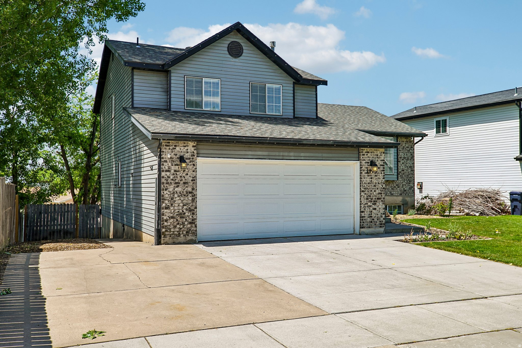 Beautifully updated Layton home with incredible versatility! Freshly painted inside and out, laminate flooring, vaulted ceilings, and an open floor plan. The oversized covered deck - freshly painted - is perfect for entertaining, and the full sprinkler system keeps the yard effortless. Mudroom and half bath off the garage, laundry chute, newer roof, water heater, and dishwasher already taken care of. The 1-bedroom basement apartment has a private walk-out to the back patio - perfect for multi-generational living or rental income. Large RV pad included. Minutes from Hill AFB, WSU Davis Campus, Layton Hills Mall, FrontRunner, I-15, and US-89. This one has it all - schedule your showing today! Buyer to verify all information.