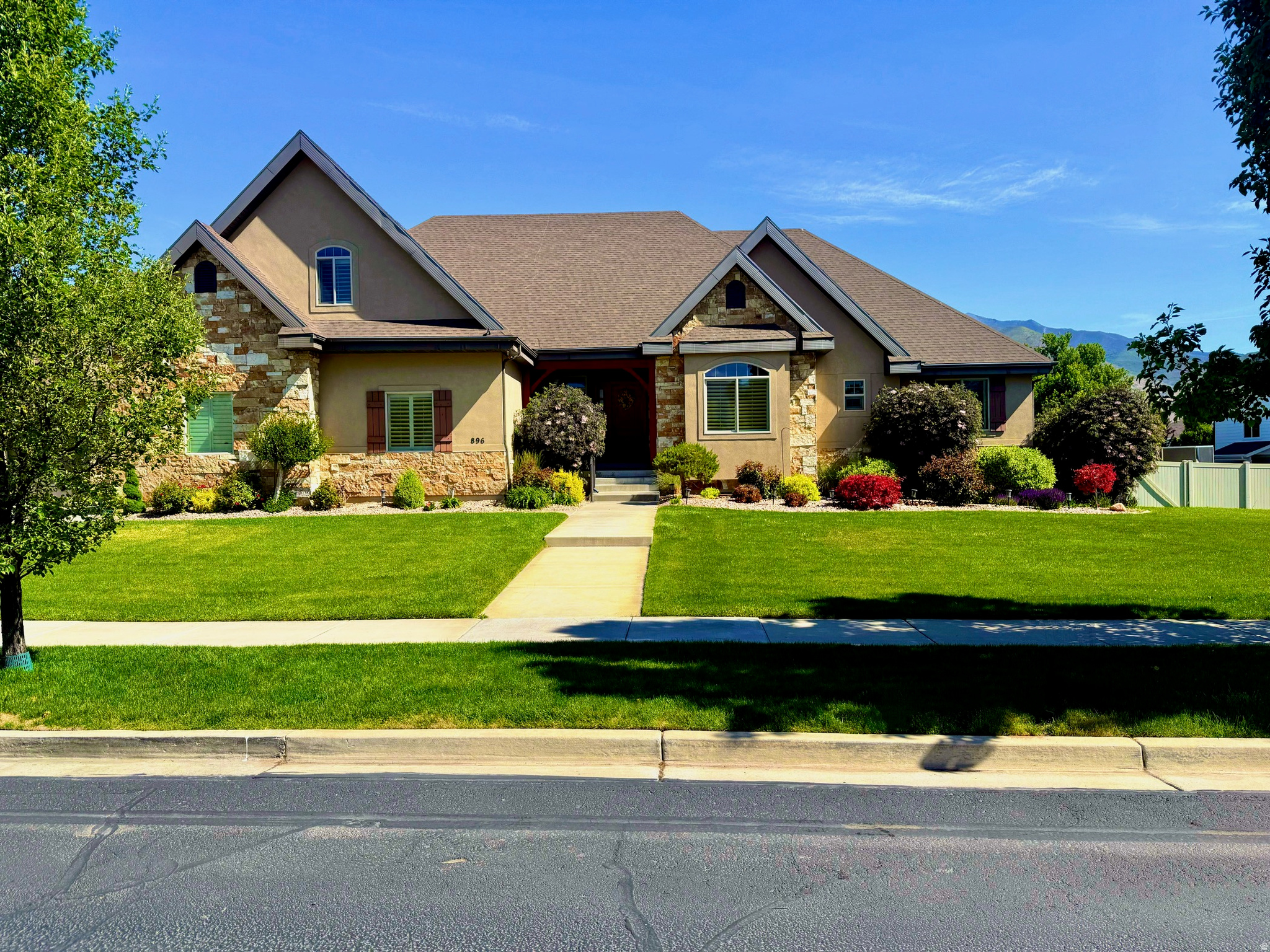 Open House May 30th 10-1!! Beautiful custom home fully finished with over 7400 Square Feet in an amazing neighborhood! Recently appraised at over 2.2 million. Bring the horses, zoned for up to 4 large animals. Great open floor plan with 7 bedrooms & 6 Bathrooms, Newer Carpet, Plantation shutters on all windows, Large kitchen with beautiful cabinetry and hidden 4.5' x 11' pantry and butterfly island, African Mahogany hardwood floors, Slate tile floors, Spacious main floor master bedroom with grand master bath and huge walk in closet, Walk in safe, three family rooms, three furnaces with HEPA filtration systems, Instant hot water, amazing basement with full kitchen, game room and theater room with 9.1 surround sound with 147" screen and projector, huge flat fully fenced back yard, covered tiled deck, 4 car garage with decorative lighting, epoxy floors and custom cabinetry, RV Parking with 50 AMP plug in, plenty of storage with sooo many other items to mention.  This home is a must see!! Call today!!