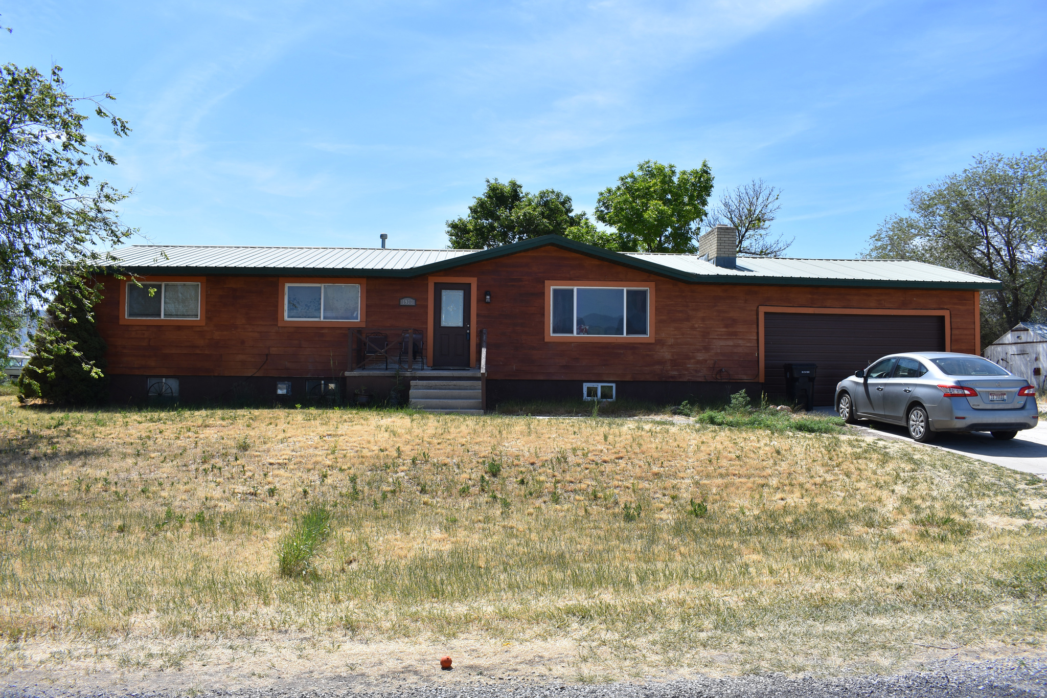 Experience the perfect blend of comfort, functionality, and country charm with this beautiful ranch-style home situated on 5 picturesque acres. Offering everything needed for a true rural lifestyle, this property is ideal for horse enthusiasts, ranchers, or anyone seeking the peace and freedom of country living.Step inside to find a warm and inviting home featuring a beautiful kitchen complete with a gas range, ample cabinetry, generous counter space, and a layout designed for both everyday living and entertaining. The open and welcoming atmosphere makes this home the perfect gathering place for family and friends.Outside, the property is fully equipped for livestock and equestrian pursuits with a spacious barn, multiple loafing sheds, and well-designed calving pens. A dedicated riding and roping arena provides ample space for training, practice, and recreation, while the expansive acreage offers room to roam and enjoy the surrounding countryside.