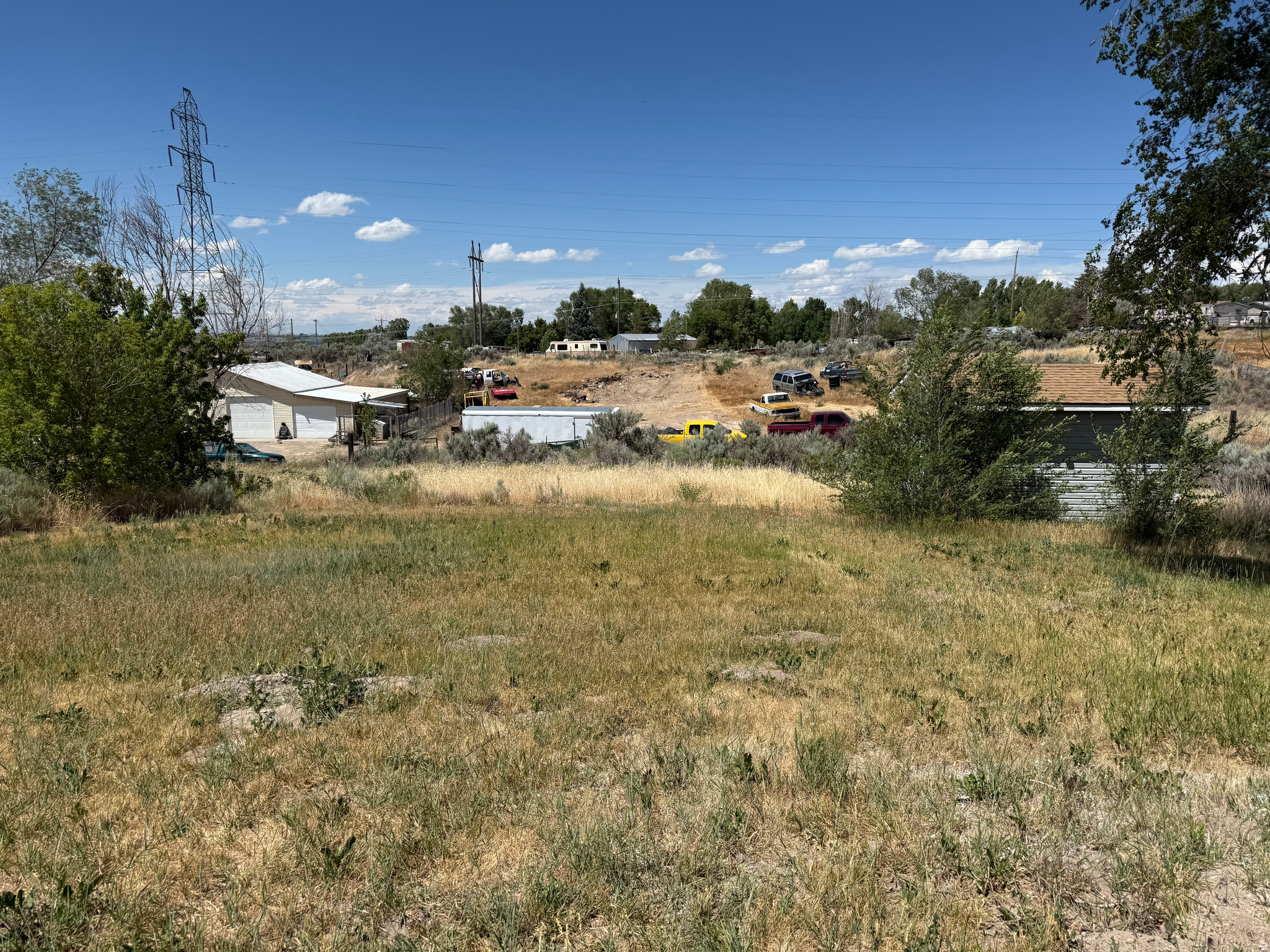Four-Plex Lot Near the High School in American Falls This four-plex-approved lot offers a strong development opportunity in a convenient and well-established part of American Falls. Located just a short walk from the high school, parks, and everyday amenities, it provides an ideal setting for future tenants seeking comfort and accessibility. The gently sloped terrain allows for straightforward site planning, and utilities are close by to support an efficient build. Whether you're an investor or a builder looking to add quality multifamily housing to the community, this property delivers a practical and promising foundation for your next project.
