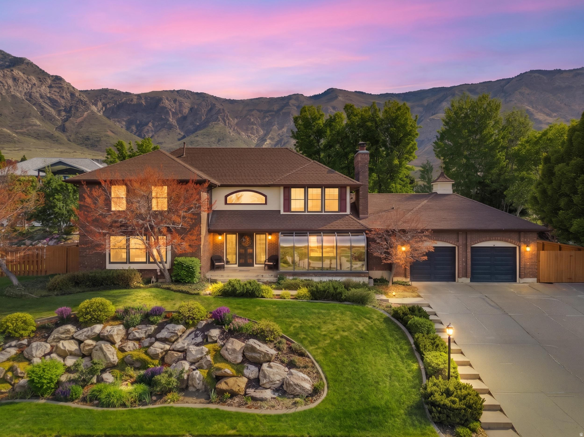 Timeless elegance meets unique character: Soaring curved walls, a grand curved staircase, and abundant natural light from skylights and the curved glass atrium windows create a dramatic yet welcoming flow throughout the home. Signature details: A stunning Venetian glass chandelier greets you in the entry, complemented by local artisan-crafted stained glass windows and rich wood flooring with high-end finishes. Generous, sun-filled spaces: Oversized rooms with thoughtful architectural touches like deep window seats invite relaxation and creativity. Private backyard oasis: A secluded fully fenced backyard with lush landscaping offers peaceful outdoor living, enhanced by a relaxing hot tub and breathtaking mountain and valley views. Chef-inspired kitchen: A dedicated pantry room, built-in wine fridge, and high-end finishes make entertaining effortless. Luxury primary suite: The grand main bathroom features custom finishes, dual sinks, and a spacious walk-in closet-your personal spa retreat. Storage & convenience galore: Extra-wide garage, abundant storage throughout, and a whole-house radon mitigation system for peace of mind. Move-in ready comfort: High-end finishes, wood floors, and thoughtful upgrades throughout ensure this home feels special from day one.