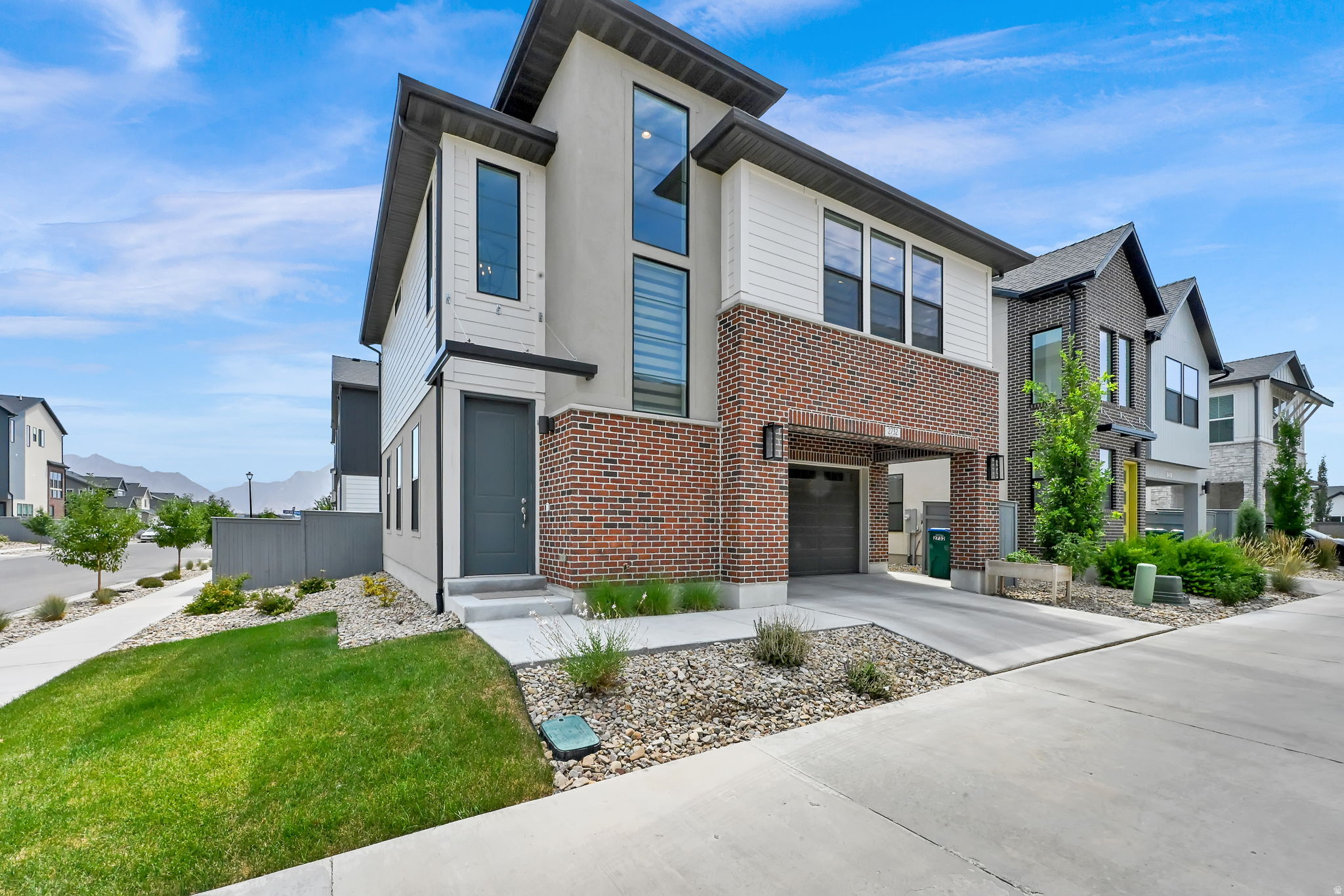 This beautiful home was built in 2024 and offers a modern design with plenty of natural light throughout. You'll find stylish finishes, quartz countertops, stainless steel appliances including a gas range, modern black railings, updated blinds throughout and a trendy entryway. Built by Ivory Homes, this home is located in the Holbrook community where you'll enjoy parks, walking and biking trails, pickleball courts and convenient access to schools and everyday amenities. You're also just minutes from I-15, Traverse Mountain Outlets, Thanksgiving Point and the new Primary Children's Hospital. The community also features a large park, sledding hill, splash pad and trails for you to enjoy year-round.