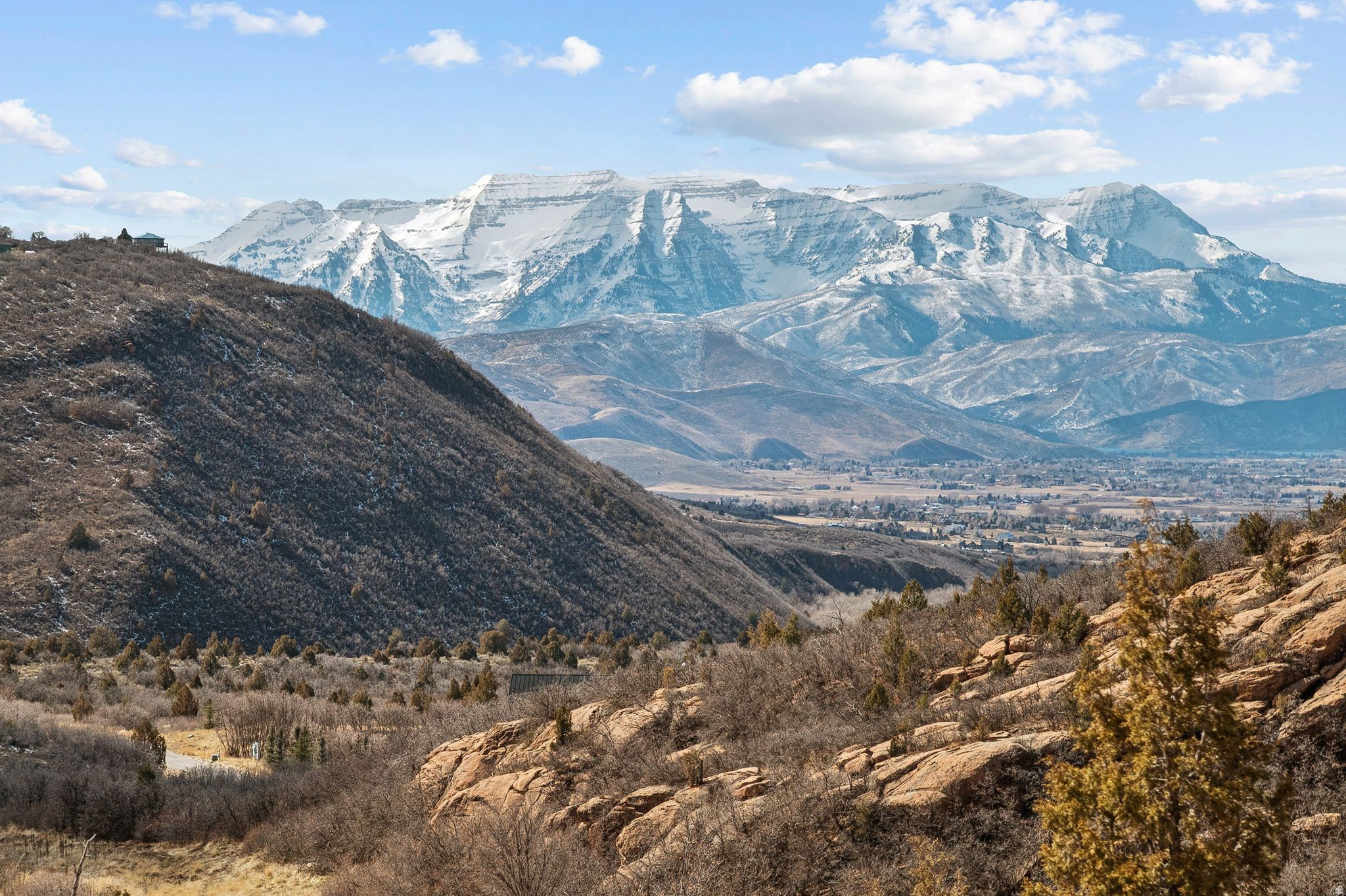 A rare legacy estate property just minutes from Heber City featuring breathtaking views of Mount Timpanogos, world famous ski resorts, and Deer Creek Reservoir. 20 beautiful acres with year-round access off Lake Creek Rd. No HOA, water and power are connected, access to a private airstrip, and an added level of privacy with gated access. Red rock and conifers provide stunning contrast in combination with the views of towering peaks of the Wasatch from nearly every corner of the property. Located minutes from endless snowmobiling and OHV opportunities in the Uinta mountains, 10 minutes from Heber City, 20-25 minutes from Deer Valley and Park City ski resorts and less than an hour from the Salt Lake International Airport. This property embodies privacy, seclusion, beauty and convenience all in one. This is an opportunity to create a true legacy property.