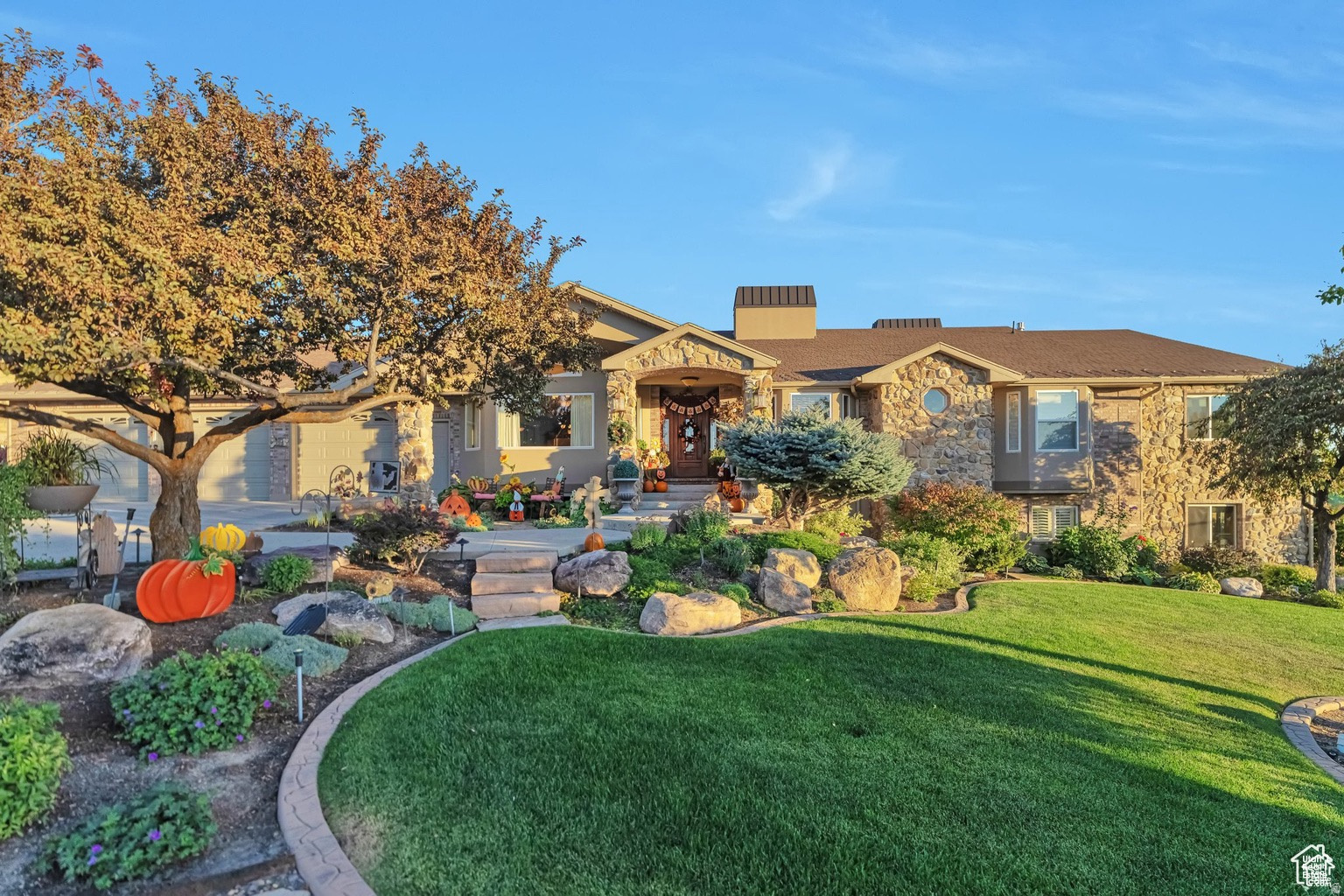 Stunning home and property with so many amenities. The home features include granite counter tops, hardwood flooring, hardwood custom trim, huge master suite, multiple laundry rooms, two kitchens and loads of storage space. This is a one of a kind custom home in a desirable bench neighborhood with views of the mountains and valley. The exterior of property features a Full sports court for tennis, pickleball, basketball, a 30x40 detached shop, a clubhouse/chicken coop and immaculate landscaping that is complete with fruit trees, grape vines, garden areas, waterfall, firepit, covered deck and patio areas. For more information or for a private showing please call listing agent.
