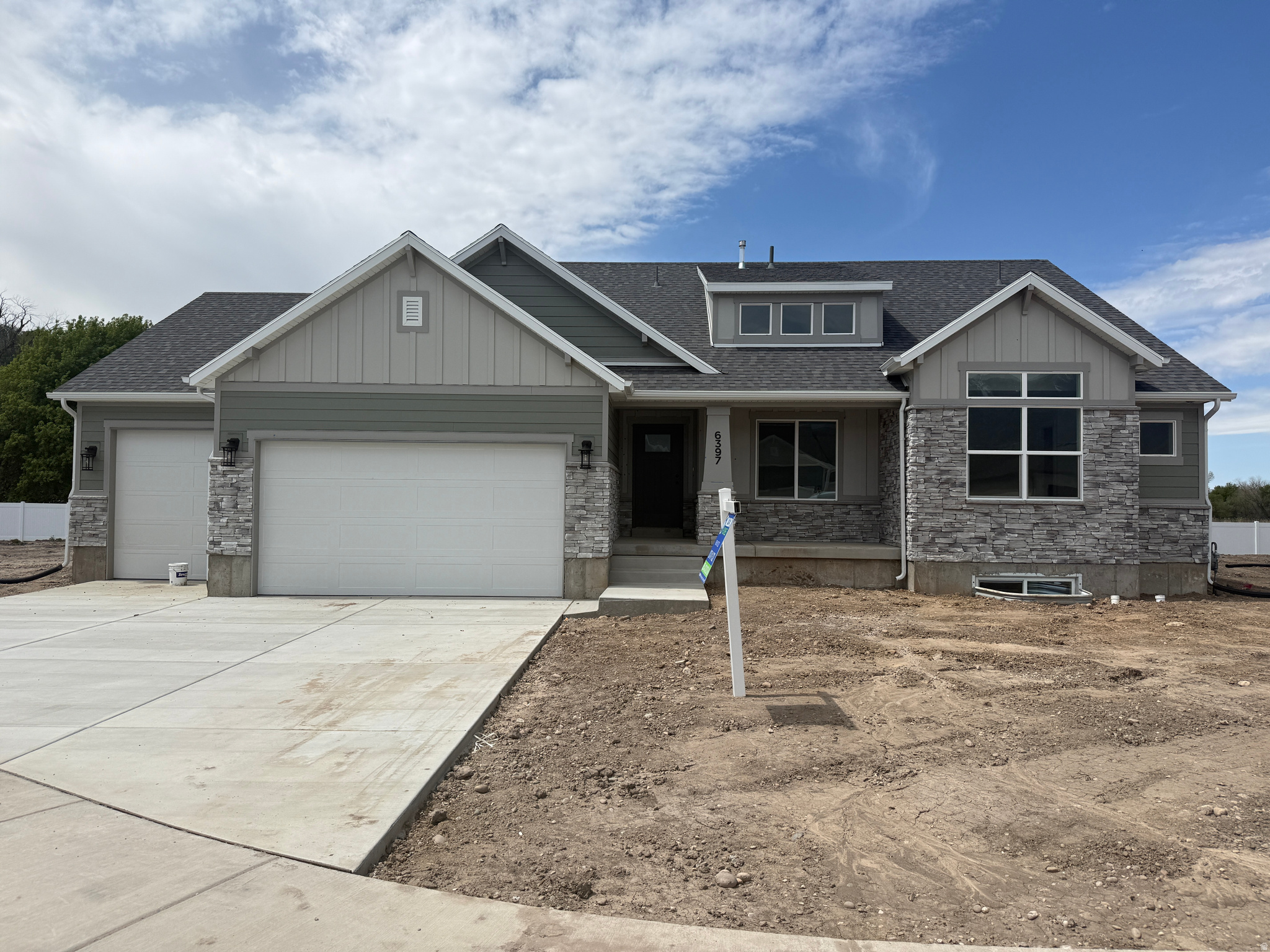 Price JUST reduced on this beautiful rambler!! NO HOA and golf, city parks & pickleball VERY close. Step inside to an open-concept/vaulted ceiling layout filled with natural light, and enjoy a spacious gourmet kitchen, huge pantry, oversized mudroom and living area ideal for entertaining.  3 spacious bedrooms and room to grow in the unfinished basement. With a 4-car garage, there's no shortage of space for vehicles, toys, or storage.  All of this is just minutes from US-89,I-84, I-15,Hill Air Force Base & Northrup Grumman. Don't miss your chance to call Riverwood home - where comfort meets convenience in one of South Weber's most desirable new communities.