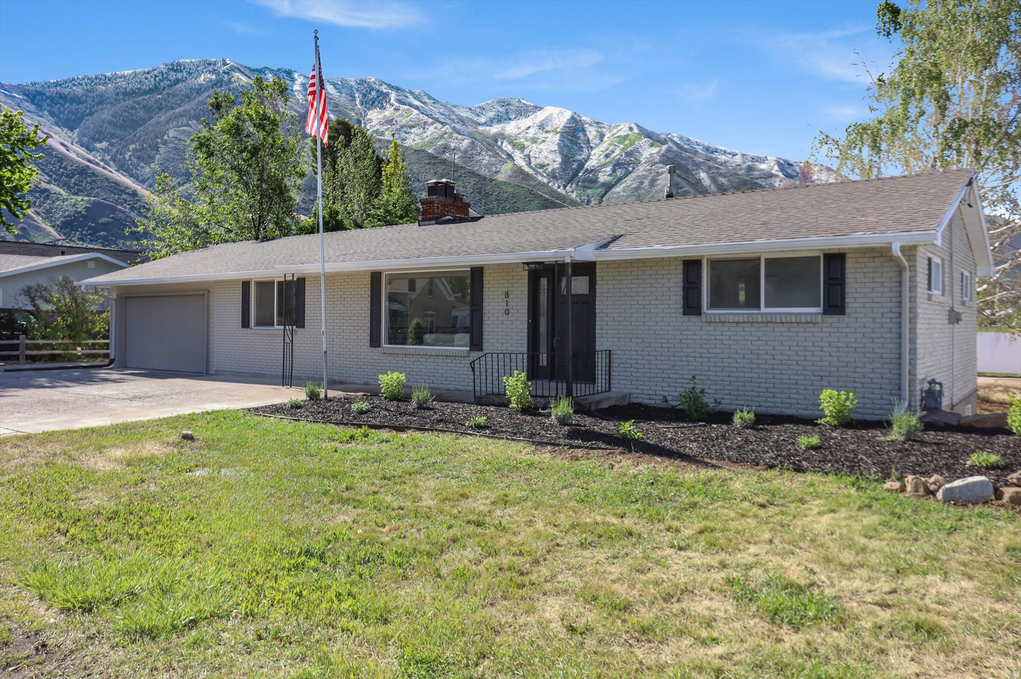 In the heart of sought-after Mapleton, this beautifully remodeled 2,300 sq. ft. brick rambler offers comfort, and breathtaking surroundings. Thoughtfully updated throughout, this 4-bedroom, 2-bath home features modern finishes, creating a warm and inviting atmosphere from the moment you step inside. Enjoy the spacious formal dining room, cozy evenings by one of two fireplaces and relaxing under the covered patio while taking in stunning mountain views with the privacy of having no backyard neighbors. Living in Mapleton is more than just owning a home, it's embracing a lifestyle. Tucked quietly against the mountains, this niche community is known for its phenomenal views in every direction, peaceful surroundings, scenic walking trails ( easy access Mapleton Parkway Trail ) and beautiful parks. This is a place where tranquility, outdoor beauty, and small town charm meet modern convenience.