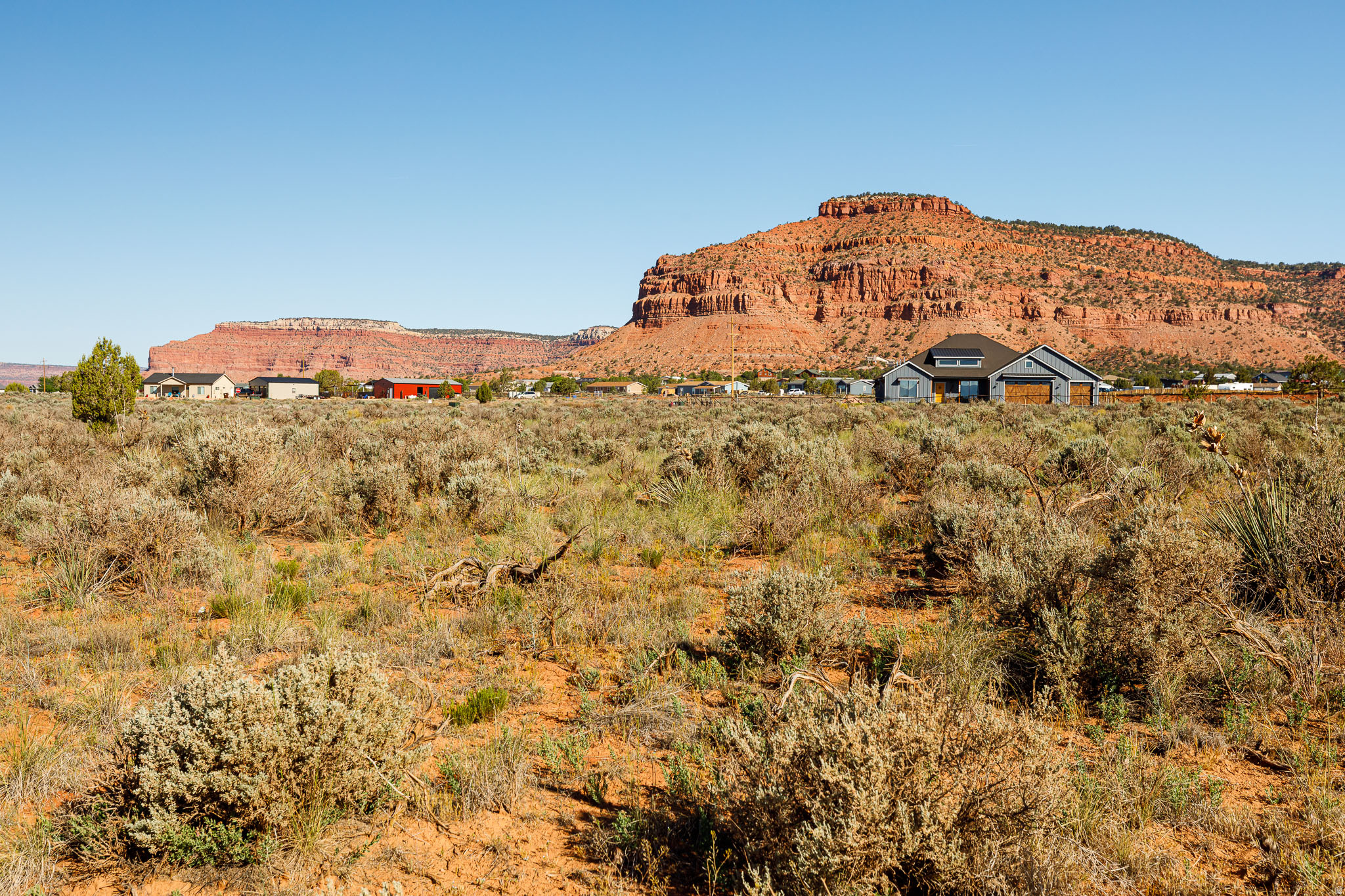 Discover your own piece of Southern Utah paradise with this incredible 2.39-acre parcel located just 4 miles east of Kanab in the highly desirable Sunflower Valley Estates. Surrounded by breathtaking panoramic views of Kanab's world-famous red cliffs, this property offers the perfect blend of privacy, scenery, and convenience. Priced aggressively compared to other lots currently on the market, this is an exceptional opportunity to secure acreage in one of the area's most scenic settings. Looking for investment or private home? This parcel checks the boxes. Even better, the property comes with professionally designed plans for a stunning 2-story, 2,680 square foot home. The thoughtfully designed layout features expansive living spaces and a large upper deck perfectly positioned for relaxing evenings, entertaining guests, and taking in Southern Utah's incredible star-filled night skies. Located near the many outdoor adventures of the Kanab area including hiking, ATV trails, Lake Powell, Zion National Park. Buyer to verify all details. Call for more information today.