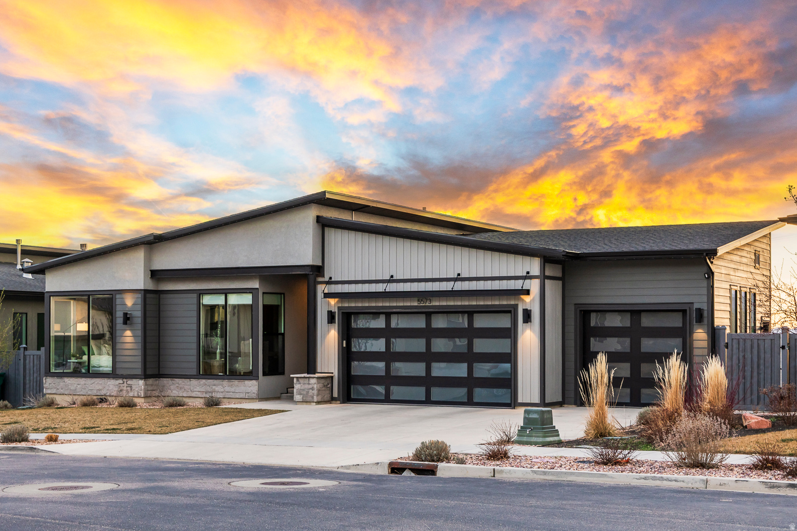 Custom designed Toll Brothers home with stunning views of Utah Valley. Located at the top of Traverse Mountain, this thoughtfully designed home offers modern and unique features- like floor to ceiling glass sliders on both the main level and from the walkout basement. Sit and relax on the large decks to watch the sunset while enjoying the crisp air and gorgeous views. 90% finished walkout basement with a flat backyard and unfinished portion pre wired for theatre. - you'll enjoy 4 bedrooms, 3 bathrooms, and a den- with plenty of storage. The primary bedroom suite is on the main level with a laundry room, guest room and office. Perfect for convenient single level living and a great work-from-home option. The fully finished basement has a large family room and two additional bedrooms- with generous living space- great for hosting. The property is fully fenced and the backyard is a blank canvas- ready for your creativity and vision. Located in a great area close to I-15 and perfect for commuting. Also, near award-winning public schools, top community amenities- such as a pool and clubhouse, & close to shopping and restaurants. You'll love living at the top of the mountain.