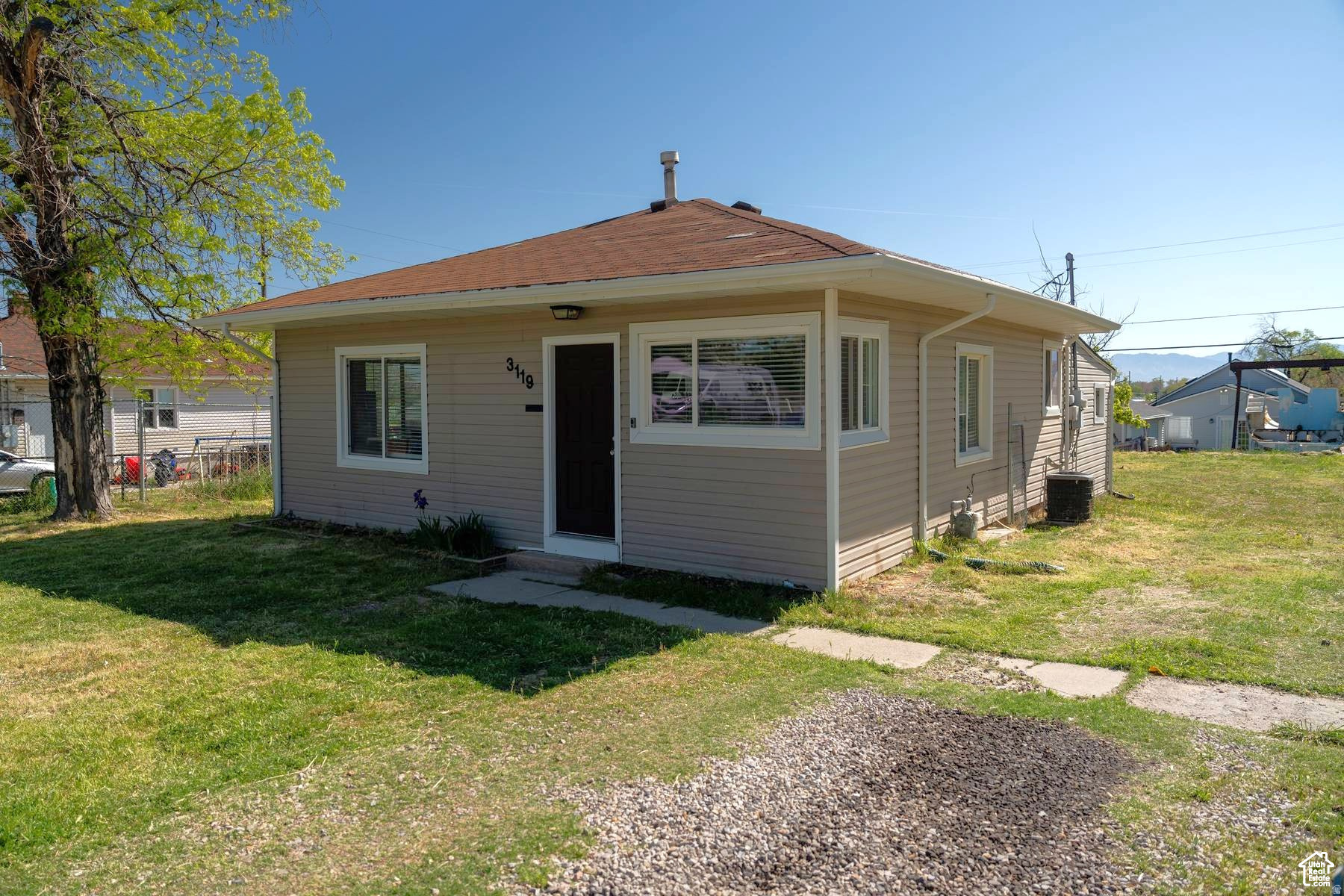 Don't miss out on this perfect starter Home in Magna with Huge Lot! enough space to add a Big Garage or even a Tiny ADU Home! The House features 2 large rooms, an updated bathroom, and Kitchen with granite throughout, 2 tone paint. It's move-in ready. The location is prime 2mins away you have a Shopping center and Restaurant options, the Copper Club Golf Course, and the picturesque Pleasant Green Park. Square footage figures are provided as a courtesy estimate only and were obtained from County. Buyer is advised to obtain an independent measurement. All information provided is deemed reliable but is not guaranteed and should be independently verified by buyer and Buyer's agent.