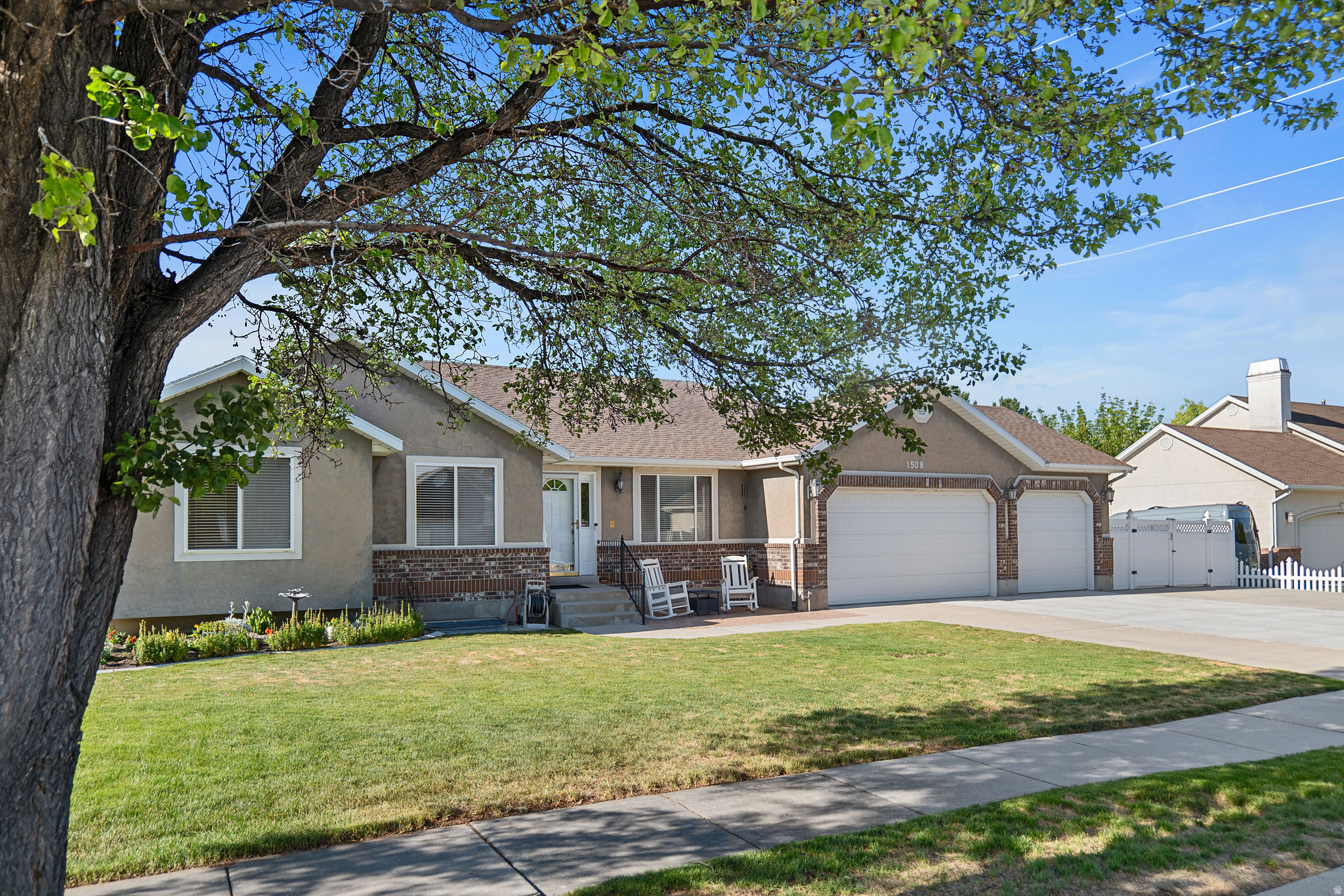 Beautifully maintained rambler with stunning mountain views, refinished hardwood floors, & spaciouse yard. The updated kitchen offers custom cabinetry, convenient pull-out drawers in the pantry & cabinets, double oven, large island, and granite countertops. The finished basement features a large family room, providing plenty of flexible living space. Located 3 homes away from a city park & close to freeway access, shopping, & dining. The designated schools currently offer Spanish Dual Language Immersion, & bus service is currently available for the middle & high school. This move-in-ready home combines thoughtful upgrades, main floor living and a unique bedroom with attached den perfect for multi generation mainfloor living or can be converted back to add an additional bedroom or office. Come checkout this beautiful neighborhood and beloved home ready for its next owners to create lifelong memories in! Square footage figures are provided as a courtesy estimate only.  Buyer is advised to obtain an independent measurement.