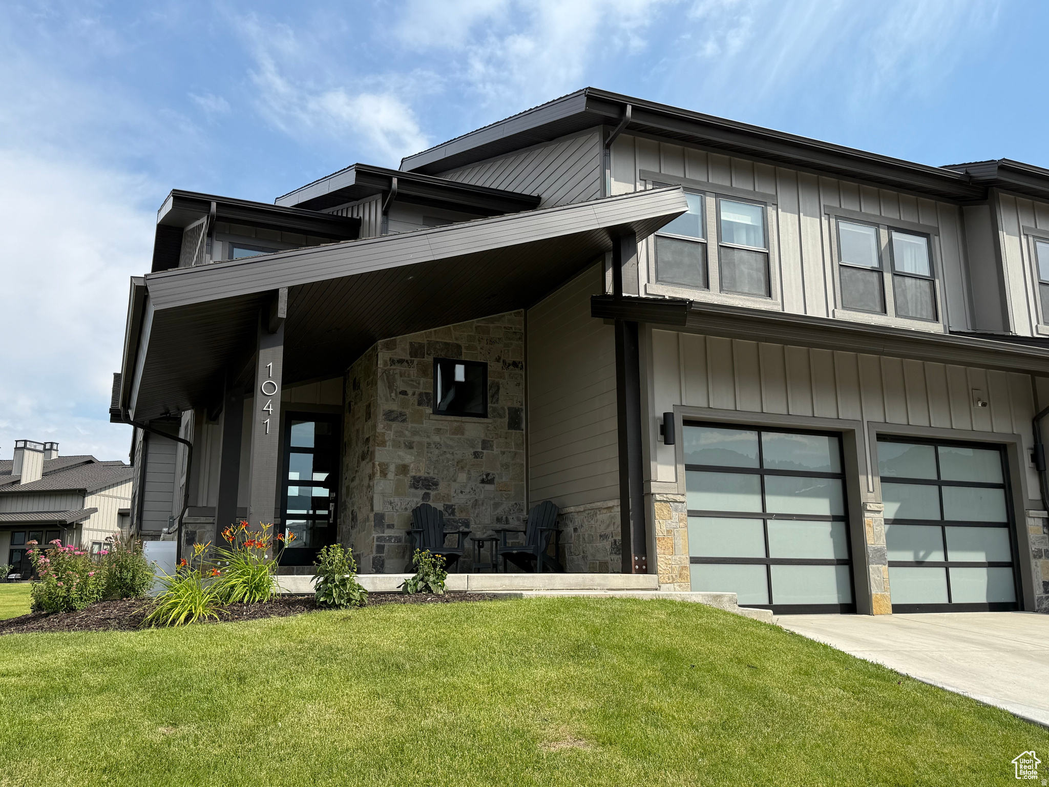 BUILT & Ready to occupy! Experience year-round mountain living in this stunning floor plan at Mayflower Lakeside-perfectly positioned between Deer Valley's East Village and Jordanelle Reservoir. Just 40 minutes from SLC International Airport and 15 minutes to Park City's world-class skiing, dining, and shopping. This contemporary retreat features a main-level primary suite, soaring fireplace, gourmet kitchen with Viking appliances, and quartz countertops. Upstairs offers a second luxurious suite plus two bedrooms with a Jack-and-Jill bath-ideal for guests or family. Epoxy garage floors and professionally installed ski racks. Automatic shades on a wall of beautiful windows, and black out shades in the bunk room. Nightly rentals are allowed-making this not only a beautiful getaway, but a smart investment. Community amenities include a Pool And clubhouse. It also includes a Pickleball court as well as basketball hoops, hot tub. Square footage figures are provided as a courtesy estimate only and were obtained from appraisals and plans . Buyer is advised to obtain an independent measurement.
