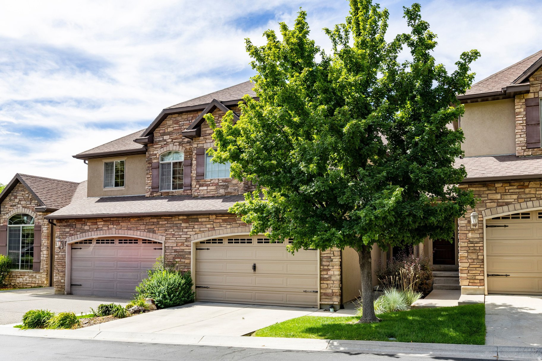 Set high on the Draper Bench, this striking 4-bedroom, 3-bathroom townhome delivers sweeping views of the Wasatch Mountains, valley, and shimmering city lights, paired with the comfort and flexibility today's buyers are looking for. The main level opens to a light-filled living space and a well-appointed kitchen designed for both daily life and entertaining, featuring granite countertops, a gas range, and vaulted ceilings that enhance the airy feel. Upstairs, a spacious primary suite is joined by two additional bedrooms, both freshly painted and carpeted. The fully finished walkout basement is a standout bonus, complete with its own bedroom, a generous family room, and enough flexibility to serve as a second primary suite, perfect for guests, in-laws, or extra privacy. A 2-car attached garage and a jetted tub round out the interior comforts. Location seals the deal: minutes to I-15 and Silicon Slopes, zoned for top-rated Canyons District schools, and just a short drive from world-class skiing at Snowbird and mountain biking right out your door. Add in premier shopping and dining nearby, and you've found Draper living at its finest.