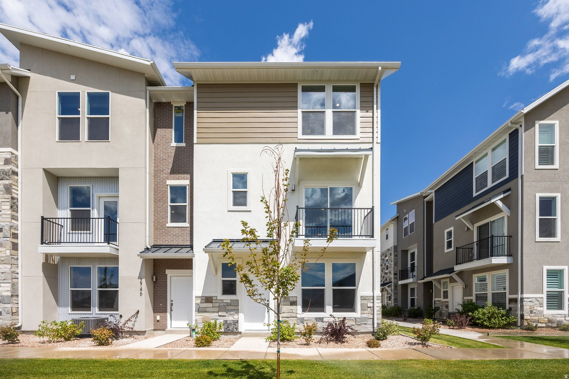 Located right across from the clubhouse! End-unit Manhattan floor plan at The Ridge at Spanish Fork. This is our largest townhome, offering four bedrooms, three full baths, an extra-deep two-car garage, two family rooms, and an open kitchen and dining area. As an end-unit, it has oversized windows and excellent views. The Ridge community includes a clubhouse with fitness center, indoor/outdoor pool, new pickleball courts, and a dog park. The location is convenient to shopping, dining, schools, I-15, and Spanish Fork Canyon. Two, three, and four-bedroom floor plans are available with new inventory ready now. We also work with investors. Tour the model home TuesdayFriday 12:006:00 and Saturday 11:004:00. Use our preferred lender and receive a $10,000 credit for a rate buydown or closing costs. Photos are of a similar finished unit.