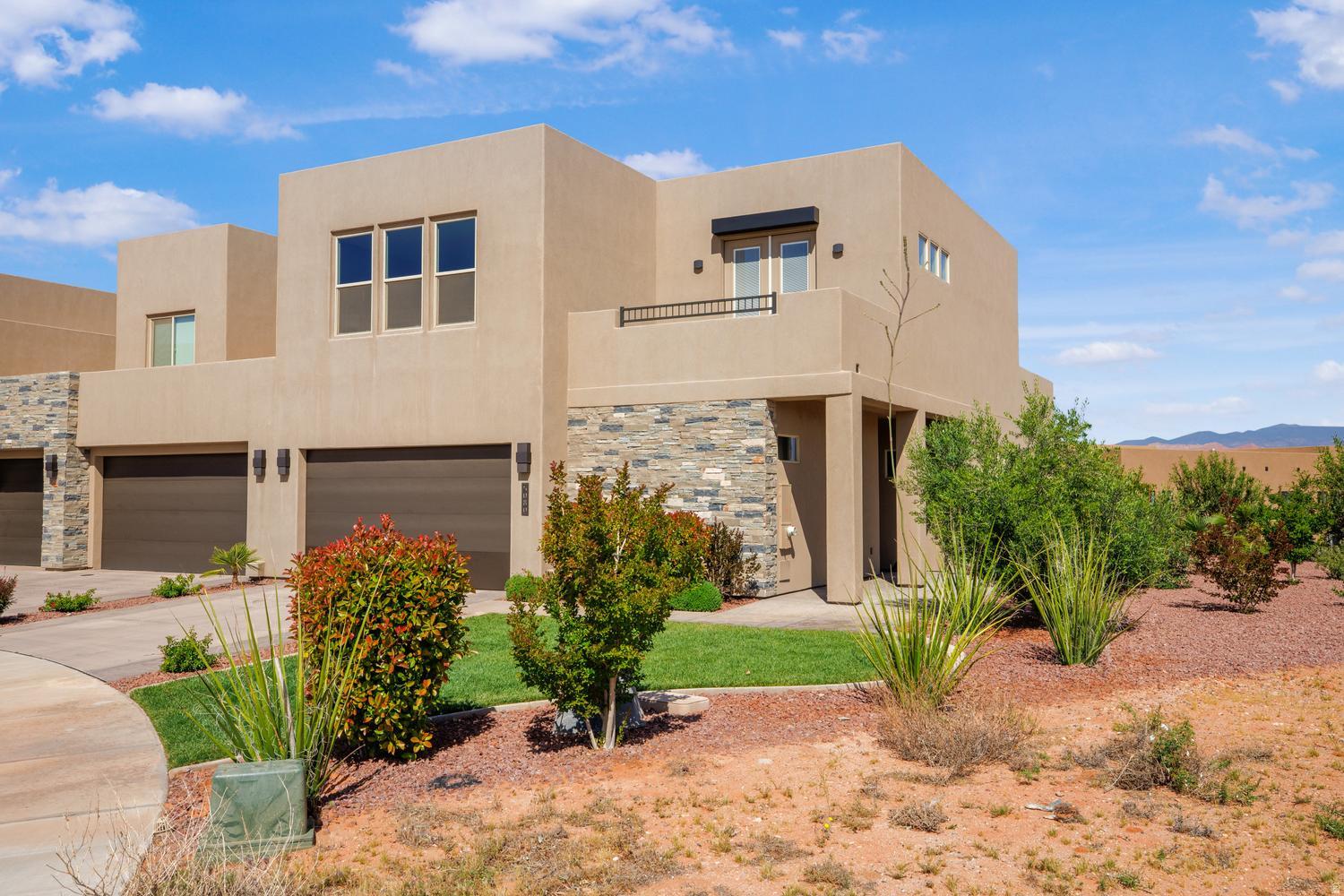Exceptional 4-bedroom, 4.5-bath VACATION RENTAL in highly sought-after Tava Resort. One of the few curated vacation homes allowed, located minutes from Sand Hollow Reservoir, Sand Hollow Golf Course, and the sand dunes--ideal for boating, golfing, and outdoor adventure. Features include an open floor plan, a linear fireplace, commercial KitchenAid appliances, and an upper deck with stunning Pine Valley Mountain views. Community amenities: 2 year-round pools, lazy river, four pickleball courts, tennis court, indoor racquetball/pickleball court, fitness/wellness center, and clubhouse. Owners enjoy exclusive discounts at Sand Hollow Resort--40% off golf, $25 Links Course access, plus pro shop and dining savings.