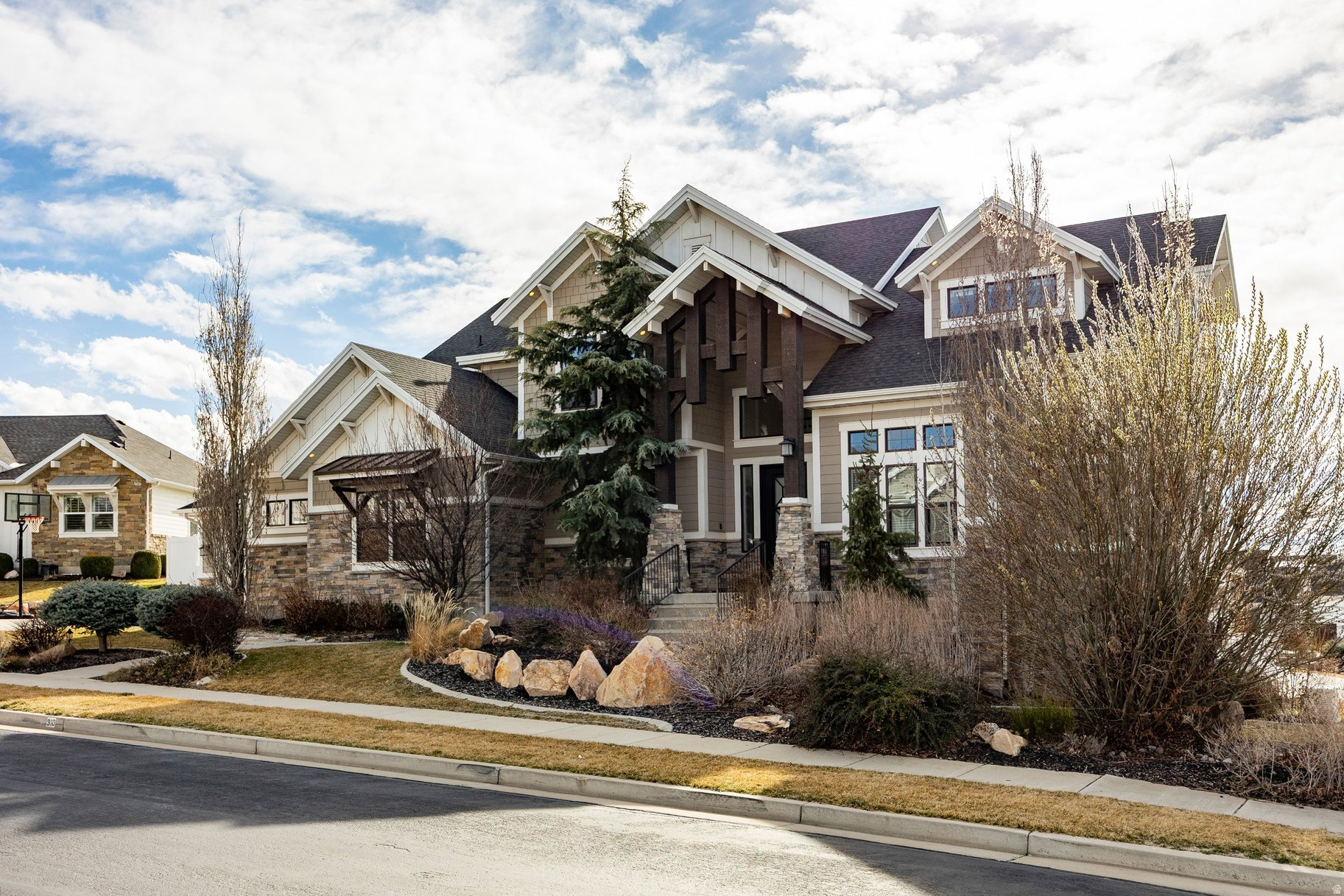 This standout custom-built home sits on a corner lot in a flat cul-de-sac high on the East Bench. With over 6,100 square feet, it offers space in all the right places. Designed for convenient main-floor living, the thoughtful floor plan includes 6 bedrooms, 5 bathrooms, two spacious family rooms, a formal living room, private office, theater room, playroom, and two laundry rooms. The current owners have upgraded and replaced numerous systems in recent years, including a new primary furnace and A/C with Ecobee smart thermostats, two water heaters, three bathroom tile shower surrounds and pans, humidifier and UV air purifier, kitchen sink with filtered water system, a Generac generator (capable of powering the entire home for up to a week), and three new side-mounted smart garage door openers with keypad access. The neighborhood, schools, sense of community, and convenience are top-notch. South Davis County is truly Salt Lake's best-kept secret-just 10 minutes from downtown Salt Lake City's restaurants, shopping, entertainment, and SLC International Airport. Residents enjoy private and public amenities just a short golf cart ride away, including Tunnel Springs Park, the Bonneville Shoreline Trail, Eaglewood Golf Course, and Eagleridge Tennis & Swim Club. Don't miss your opportunity, schedule a private tour today!