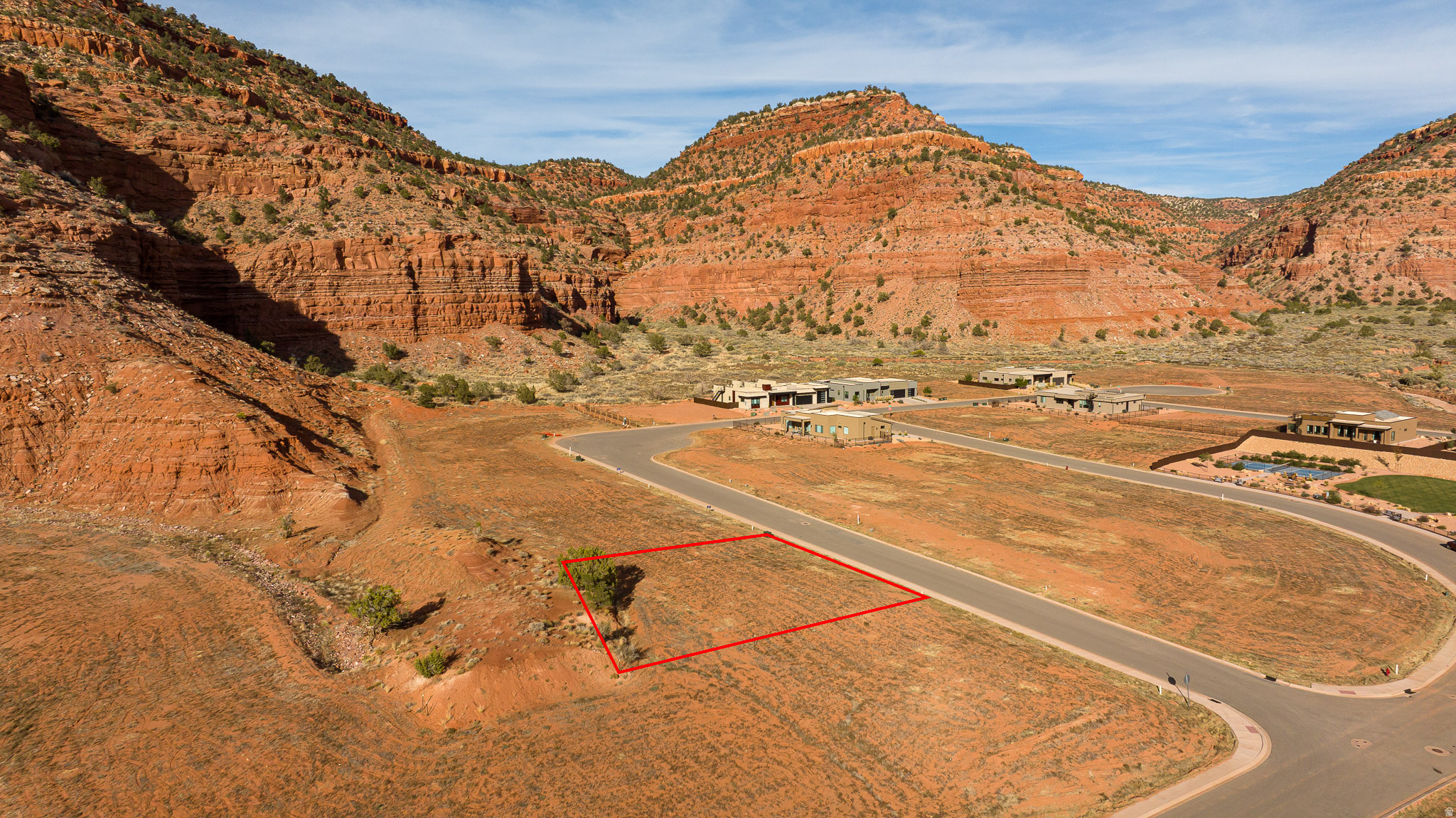 Build your dream home in the beautiful La Estancia subdivision, where upscale living blends seamlessly with the breathtaking beauty of Kanab's Red Rock landscape. Wake up every morning to sweeping red-rock vistas and enjoy direct access to Tom's Canyon and a network of scenic hiking trails. This low-maintenance lot offers the freedom to choose your own builder and build on your own timeframe, creating a custom retreat that perfectly fits your vision. Residents can enjoy resort-style amenities, including a pickleball court, clubhouse, an indoor and outdoor pool and spa, fitness center, and community dog park - all maintained through the HOA for effortless living. This lot backs up to open space! A completed soils test is available to simplify the build process. Whether you're planning a full-time residence, a vacation getaway, or a short-term rental investment, this parcel offers the perfect canvas in one of Kanab's most desirable luxury communities. Your Red Rock escape awaits! (Buyer to verify all)