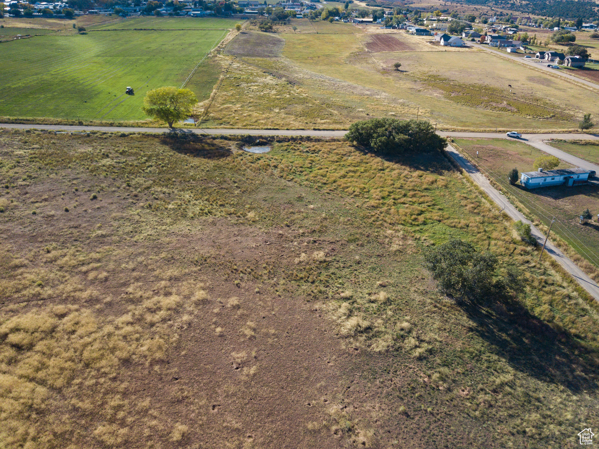Presenting a remarkable opportunity to acquire prime land in the desirable Monticello area. This exceptional property boasts unobstructed, panoramic views of the surrounding mountain ranges, offering an inspiring backdrop for your future endeavors. The land features level, usable terrain, providing an ideal foundation for development or agricultural pursuits. Benefit from the convenience of existing utilities located at the street. Zoned AG/RES, this parcel accommodates horses, making it well-suited for equestrian enthusiasts or those seeking a rural lifestyle. 10 water shares included. Tracts A, B, C, D, and E are all parts of parcel #A33240305405 and will receive their own parcel numbers upon closing.
