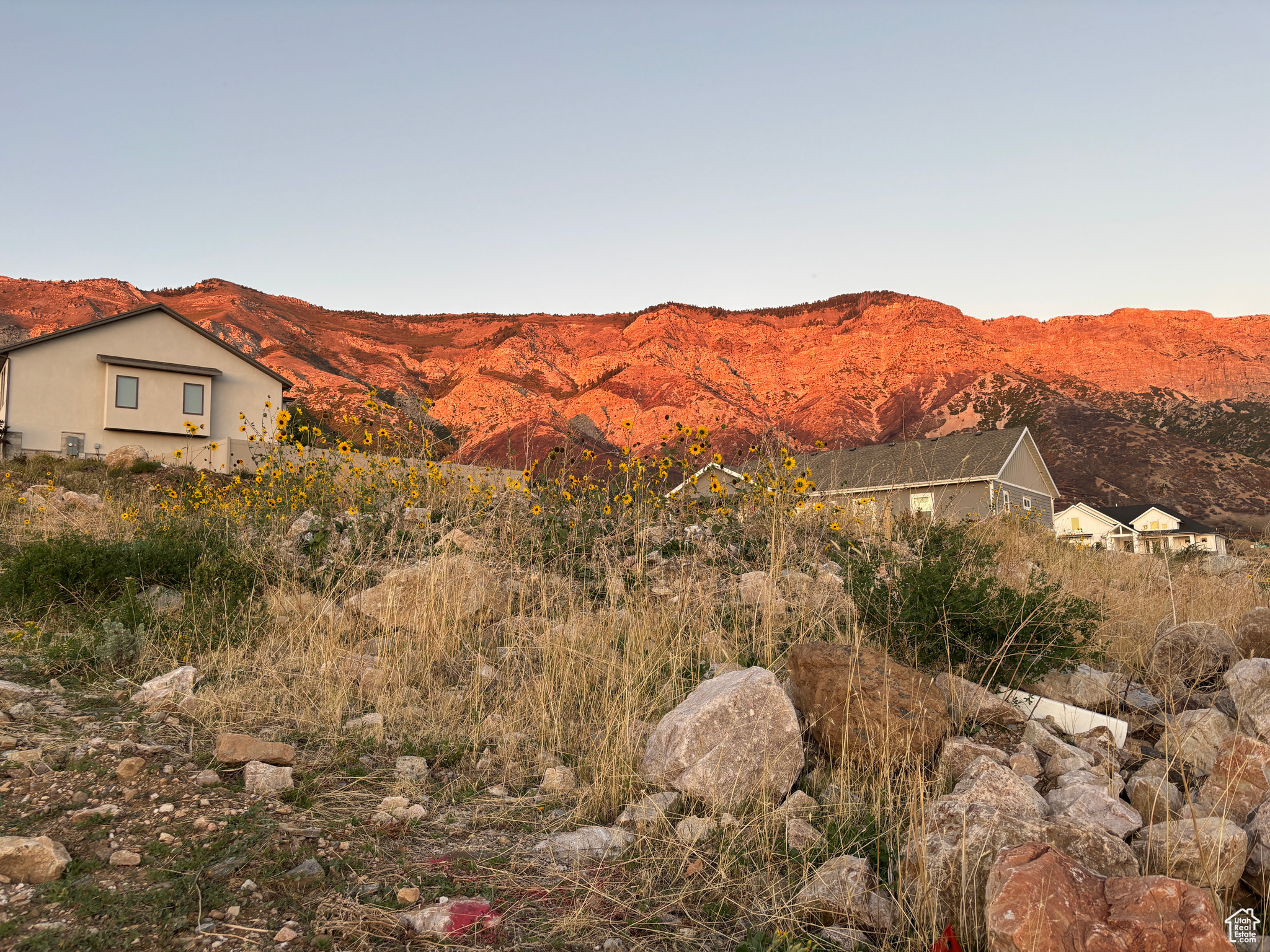 Welcome home to amazing views. Frame Ben Lomond peak in your new build home on one side and highlight valley views on the other. Any way you turn there is beauty to soak in. This lot sits in a great neighborhood on a quiet street. We can recommend a couple of excellent builders or bring your own. Location is key and this lot boasts a great one.  Curb & gutter already installed. All utilities stubbed and ready for connection along with secondary water.  Acreage figure is provided as a courtesy estimate only and was obtained from county records.  Buyer is advised to obtain an independent measurement.