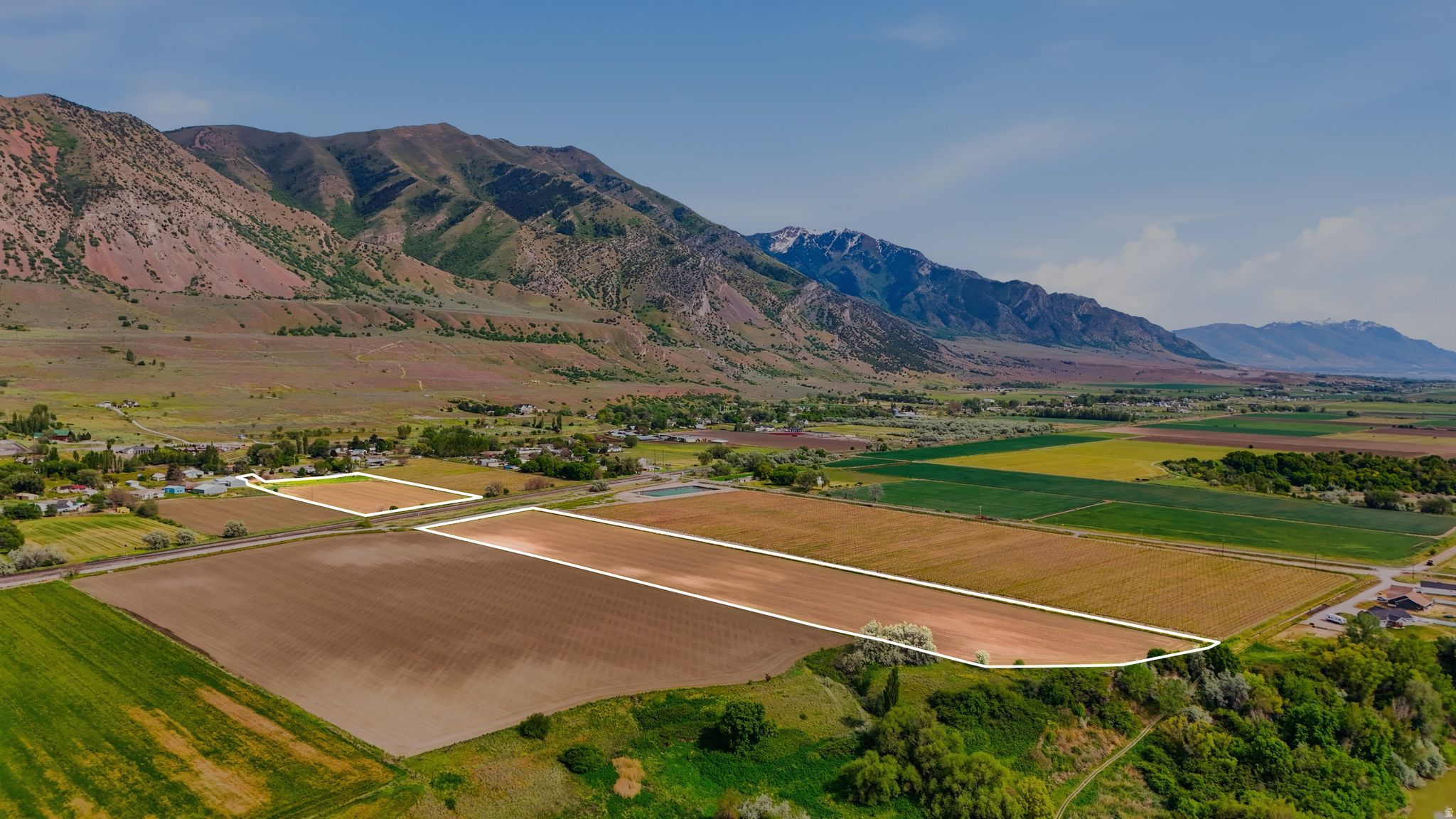 Zoned A-20, this property is intended for agricultural and rural uses, with parcels created after 1993 requiring a minimum lot size of 20 acres (buyer to verify all future use possibilities). The property is currently leased for farming through September, offering immediate agricultural use and potential income opportunity. Irrigation water is accessed through a nearby head gate approximately 100 feet from the end of the field and operates via gravity flow with flood irrigation. Current tenant farmer has indicated flexibility for the existing lease to continue through harvest or to negotiate a crop payout if preferred. The farmer has also expressed interest in continuing to lease the land for future farming operations should the new owner desire.  A Semi adjacent 5.39 acre parcel is also listed. Photos show both parcels