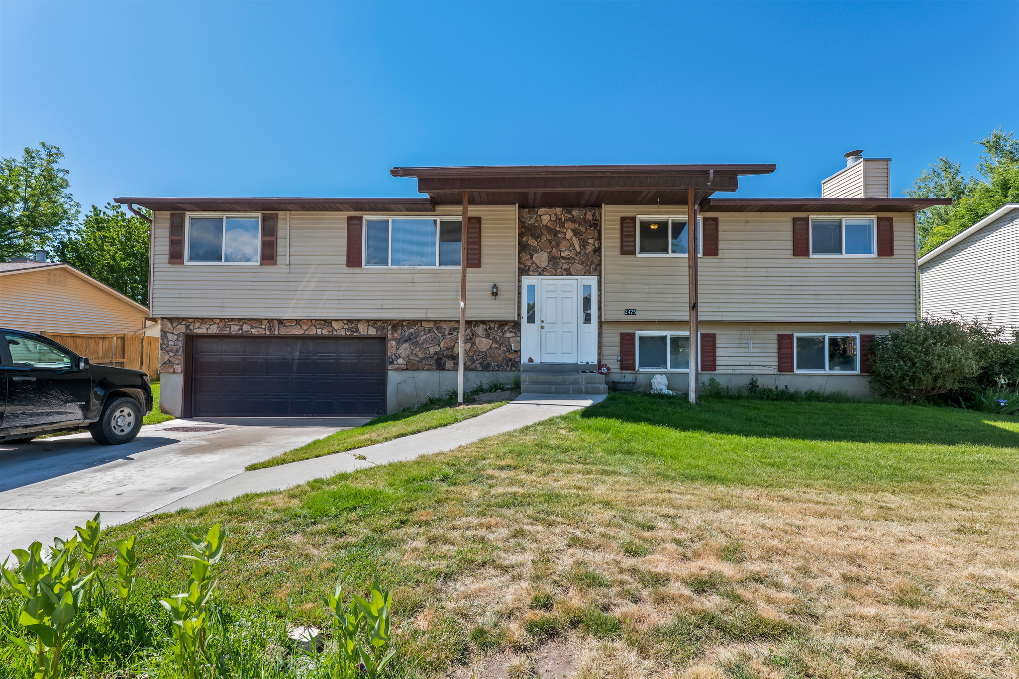 Needs Face Lift - Great area!  5 bedrooms- garage ! good size home at a great price! Roof is good and the HVAC works great.