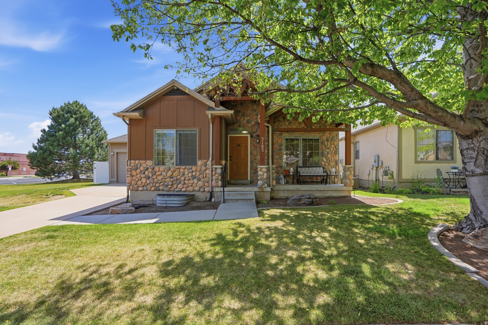 OPEN HOUSE, SATURDAY  JUNE 13TH 2-4PM! Welcome home to this beautifully updated rambler home in the desired neighborhood, The Ranches at Stone Creek community. Enjoy main-floor living with thoughtful upgrades throughout.  Walk in and find lots of natural light throughout the home. Walk in to a foyer, a perfect reading nook with views of the front yard. The first room has beautiful French doors and can be used as a bedroom, home office, or music/flex space. Next to that is a full bath, situated perfectly before the living room with custom-built-in shelving and fireplace, a perfect place to unwind after a long day.  The open concept between the living room and dining space, that also opens to a spacious kitchen. The kitchen includes brand-new stainless steel appliances (2024) and ample counter space, making it perfect for entertaining or everyday living.  The main-level owner's suite features a spacious walk-in closet and a private bath with a spa-like entrance, featuring double sinks, and a separate tub and shower.  The fully finished basement features a theater room ready for customization, a large living area, and an unfinished space that can be converted into two more bedrooms, one of which could serve as a second owner's suite with its own bathroom, giving you flexibility and room to grow. The home sits on a corner lot with mature landscaping and a new privacy fence (2024). Recent upgrades also include a new HVAC system (2024), a solar panel system (paid for in 2023), a new water heater and water softener (2024). Pets are welcome in this friendly well-maintained community. The HOA handles exterior maintenance, so you can enjoy true lock-and-leave convenience. With parks, shopping, and schools nearby, this home is clean, updated, and ready for its next owner. * Listing Incentive: Receive a free 1-0 buydown, giving you a 1% lower interest rate for the first year. Incentive offered by Nikko Denis at Intercap Lending. Terms and conditions apply. Buyer must qualify. Rates subject to change without notice.** Call us today to schedule your showing!