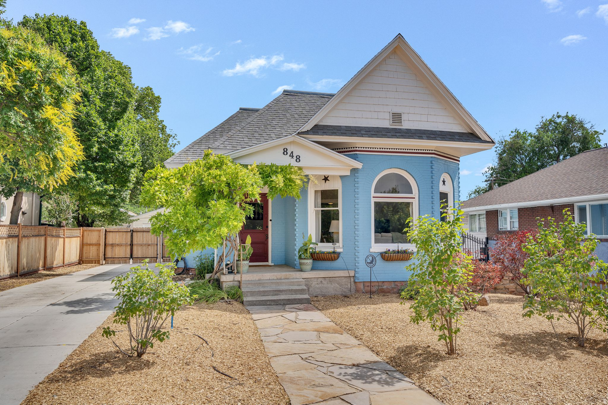 This Victorian charmer is the perfect blend of historic architecture and thoughtful modern updates. New back den can be a third bedroom just add French doors. The inviting interior features spacious living and dining rooms with soaring 9-foot ceilings, exquisite original woodwork, elegant bay windows, and beautiful hardwood floors. Thoughtfully updated bathrooms, convenient laundry, and a stunning family room addition with a cozy gas fireplace provide today's comforts while preserving the home's timeless character. Step outside to a secluded backyard paradise featuring a beautiful stone patio, a gorgeous lighted gazebo with built-in misters, and a charming garden area. Designed for relaxing and entertaining alike, this private outdoor retreat is truly an entertainer's paradise. Just a few of the extensive list of updates includes owned solar panels, a new refrigerator, dishwasher, microwave, bedroom carpeting, furnace, air conditioner, heat pump, water heater, exterior paint, and main sewer line-offering peace of mind for years to come. Ideally located in one of the city's most desirable neighborhoods, you'll love being just minutes from the vibrant shops and restaurants of 9th & 9th, Liberty Park, and the McClelland Trail. Enjoy the convenience of strolling to your favorite coffee shop, local restaurant, or neighborhood market while experiencing the charm and walkability that make this area so special. Buyer to verify all.