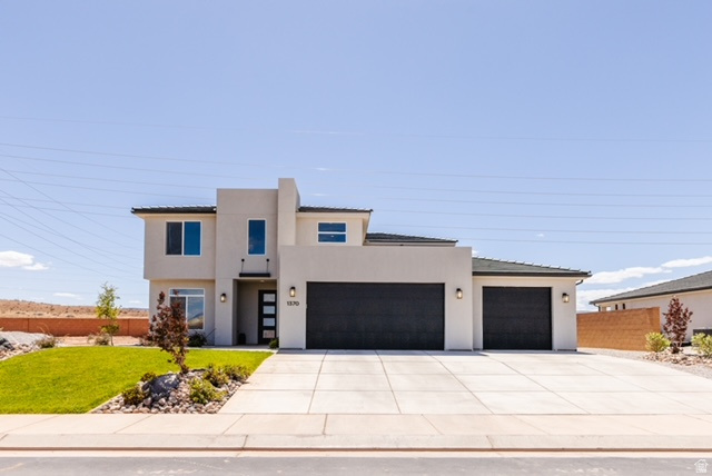 BOLD. BEAUTIFUL. UNEXPECTEDLY ATTAINABLE! From the moment you pull up, the clean modern lines and oversized driveway set the tone. Step inside and it only gets better! Warm, wide-plank flooring flows through bright, open spaces designed for real family living. Natural light pours in, highlighting a layout that feels both elevated and inviting. The Kitchen, a total standout! Warm white cabinetry, sleek finishes, a statement island, and large walk-in pantry. The living areas are exactly what buyers are craving right now, open but defined, spacious but comfortable, truly designed for family connection. The bedrooms are nicely sized and the large primary retreat is on the main floor with a large primary bath, dual sinks, soaker tub and large master shower. The 5 secondary bedrooms are large with room to breathe. Every detail from the upgraded finishes to the thoughtful layout, reflects a home that's been loved and maintained well. The energy is calm and ready for the next family.