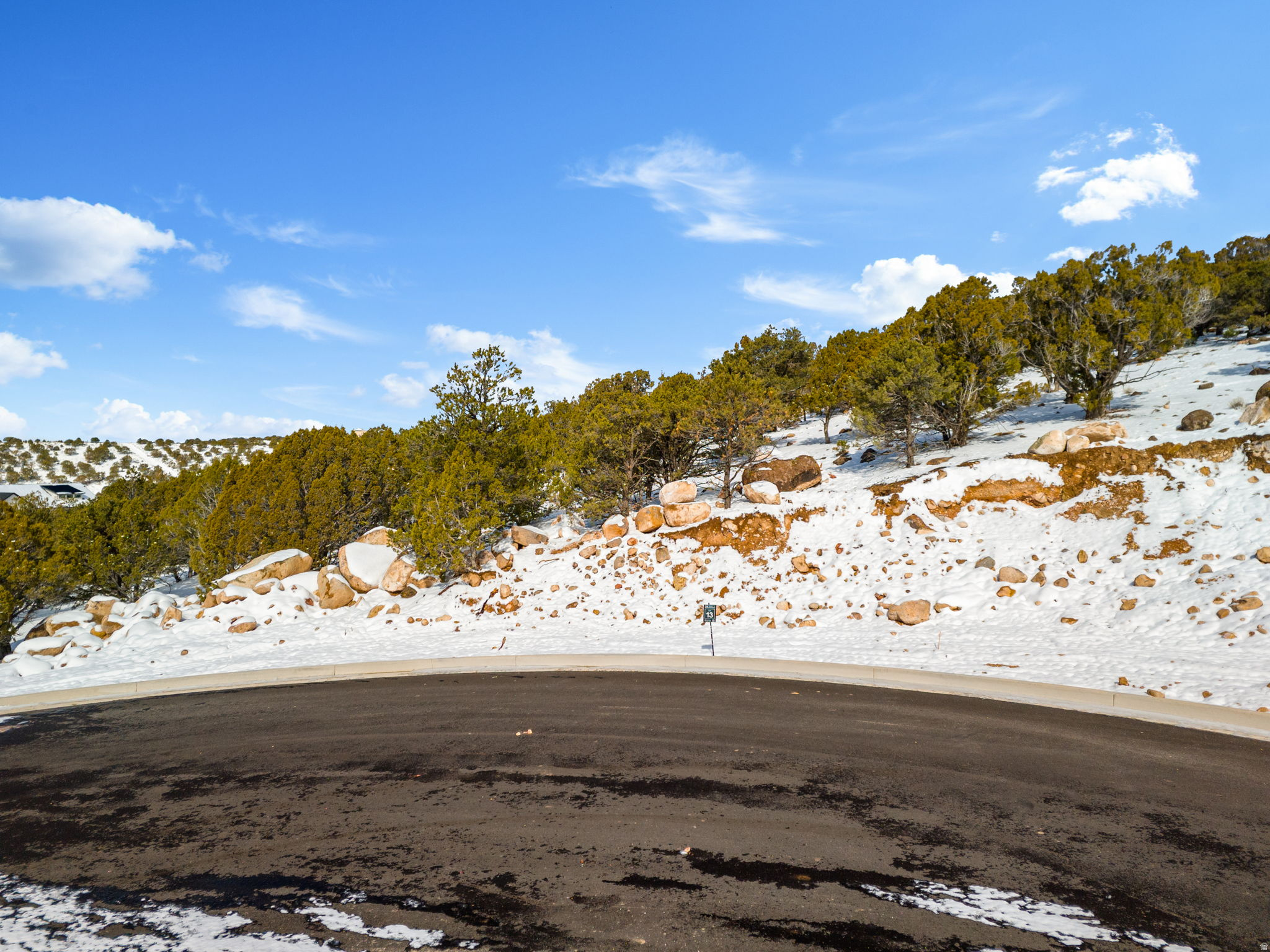 This is Lot Number 13, a .7-acre homesite located in the highly sought-after Estates at South Mountain subdivision. Enjoy stunning views of Shurtz Canyon and the surrounding Southern Utah mountains. This growing community is positioned near planned future elementary, middle, and high schools, adding long-term value and convenience. Bring your own builder or choose to build with the South Mountain Development team. Don't miss this opportunity to secure a premium lot in one of Cedar City's most desirable neighborhoods.