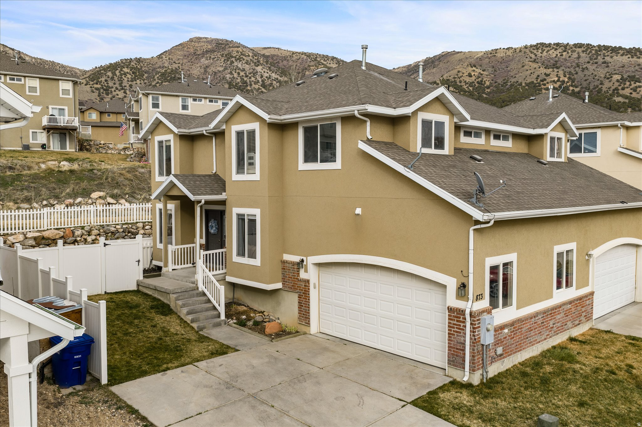Life feels different here! Peaceful mornings, unforgettable views, and a home that truly welcomes you. Step inside this beautifully maintained 4 bed, 4 bath twin townhome located in one of Morgan City's most desirable communities. The open concept main level features spacious living and dining areas, a modern kitchen with new granite counters, new tile backsplash, and seamless flow to a private fenced backyard, perfect for entertaining guests or enjoying peaceful evenings outdoors. Upstairs, discover a generous primary suite with walk-in closet and ensuite bath, plus two additional bedrooms and full bath. LVP flooring on the main level and Fresh new carpet upstairs add both comfort and style. A finished basement provides flexible space for a fourth bedroom, home gym, or guest suite. Enjoy mountain views, a two car garage, and low maintenance living with close proximity to parks, schools, local shops, gas, groceries, recreation, and I84. Just minutes from Ogden and Snowbasin Resort, this Morgan County gem combines modern style and small town charm.