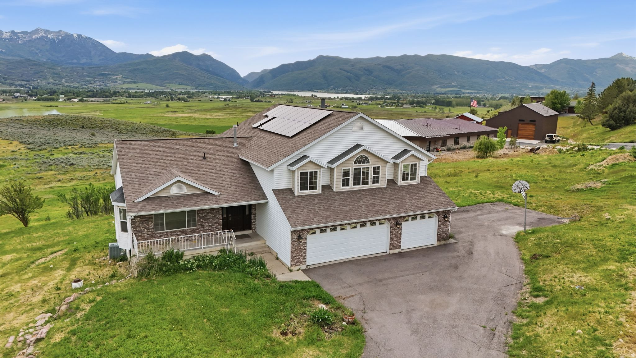 HURRY THIS WONT LAST LONG. GREAT LOCATION WITH DESIRABLE VIEWS. THIS HOME SITS ON 2.24 ACRES AND OVERLOOKS THE PINEVIEW RESERVOIR AND OGDEN VALLEY. HOME HAS JUST UNDER 5,000 SQ FT WITH AN UNFINIASHED BASEMENT WITH ROOM TO GROW. SPACIOUS FLOOR PLAN WITH SOLAR PANELS. HOME NEEDS TLC THROUGHOUT BUT IS READY FOR YOUR BUYERS' RENOVATIONS. Please note that square footage figures are provided as a courtesy estimate based on county records. Buyers are advised to obtain an independent measurement. All information provided is deemed reliable but is not guaranteed and should be independently verified by the buyer and the buyer's agent. SEE AGENT REMARKS FOR OFFER SUBMISSION.