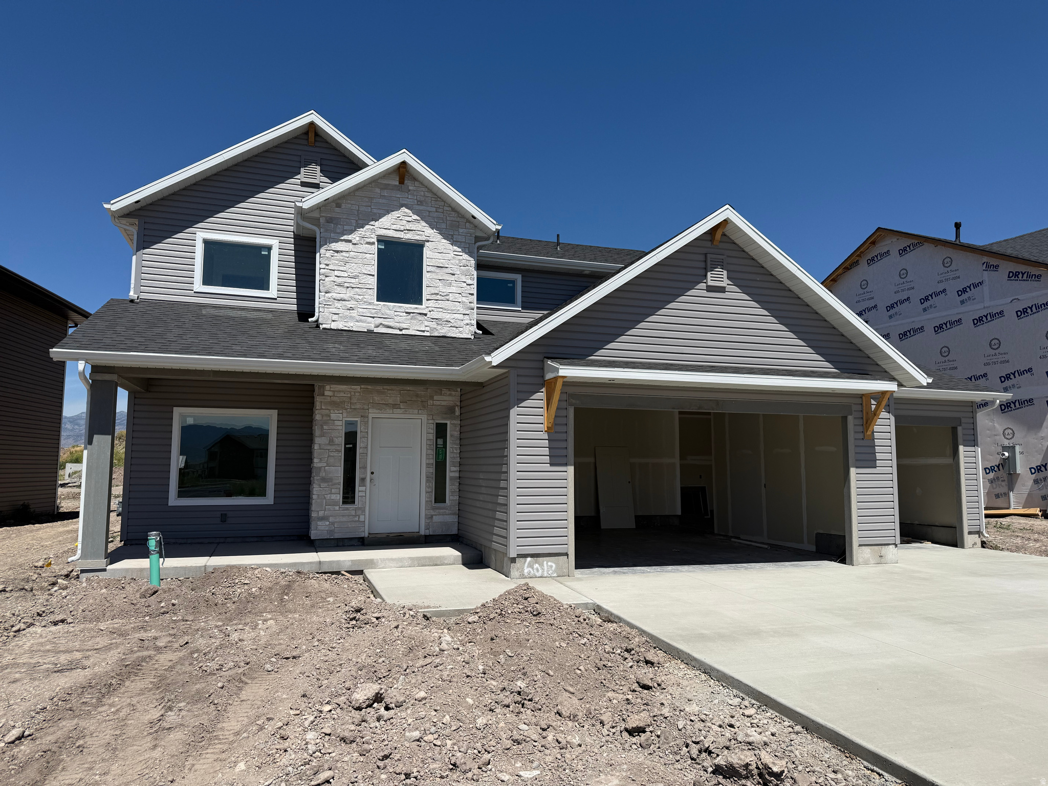 This beautiful home will be completed on by the end of July! This home has a craftsman styled exterior and modern features inside. The main floor features a 17' foyer entrance, an office, a half bath and mudroom, an oversized great room and dining space, and a functional kitchen with a walk-in pantry. Upstairs are 4 large bedrooms, 2 full bathrooms, and a laundry room. The excess of windows in this home lets in lots of light and mountain views! Seller is offering $10,000 towards closing costs when using a preferred lender. Come check it out today!