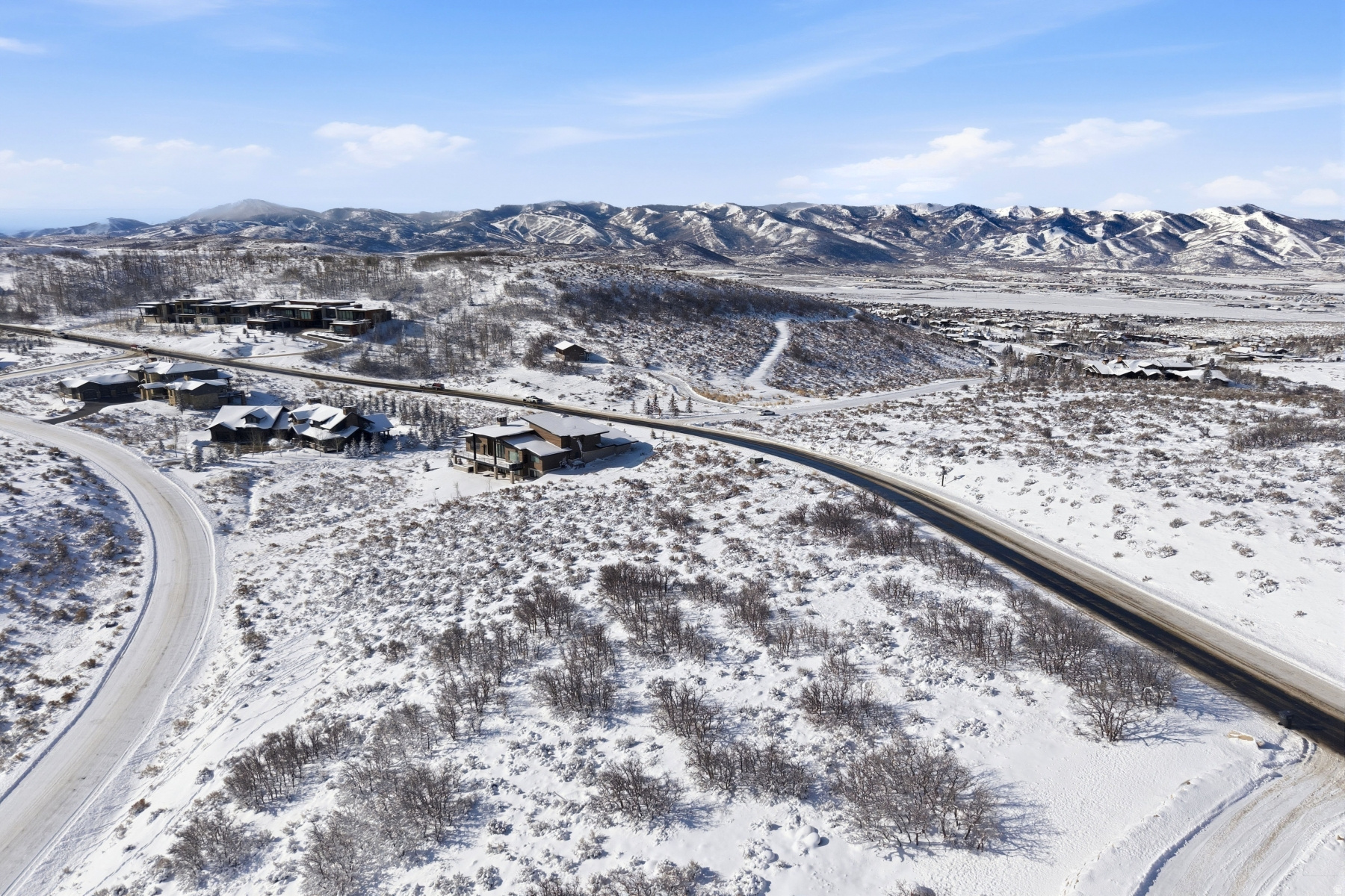 Premier Promontory Homesite with Beautiful Mountain Views -- Build your dream mountain retreat on this beautiful 1.15-acre homesite in the private gated community of Promontory Club. Ideally positioned along Promontory Ranch Road, this gently sloping lot offers expansive easterly views toward the majestic Uinta Mountains, with the potential for southwestern views capturing Park City's renowned ski resorts and dramatic Wasatch sunsets. The gradual topography provides an excellent building envelope, allowing for a variety of architectural possibilities while maximizing the surrounding mountain vistas and natural landscape. Ownership in Promontory provides access to one of the most amenity-rich private club communities in the Rocky Mountains. Members enjoy world-class golf on courses designed by legends such as Pete Dye and Jack Nicklaus, multiple clubhouses with dining and social spaces, a luxury spa and fitness center, tennis and pickleball courts, equestrian facilities, miles of private trails, and family-focused amenities including The Shed clubhouse and beach-style lake club. Promontory's 7,200-acre private mountain community is designed for recreation, connection, and multi-generational living, offering year-round activities from golf and hiking to skiing and outdoor adventures, all just minutes from the historic charm, dining, and world-class skiing of Park City. A rare opportunity to build a custom home in one of Park City's premier luxury communities while capturing breathtaking mountain views and the exceptional lifestyle that Promontory is known for.