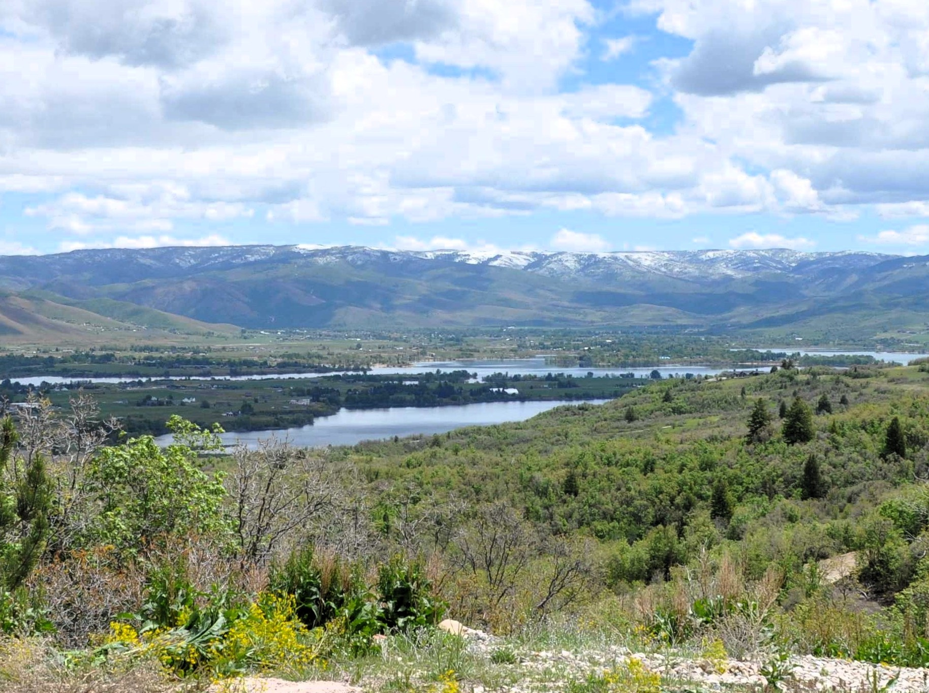 Prime 1.48 acre lot with unobstructed water and mountain views. Ideal setting for a custom home with privacy. This sloped lot offers multiple build options and excellent natural light. Nordic Valley Master Plan is getting underway and now is the time to buy a lot.  You have close access to 3 ski resorts, recreation, dining, and local amenities. Rare opportunity to secure a lot with a view with this level of privacy and scenery.  Perc test was completed and passed.   Geo tech completed. Water fees paid All property information and documents to be verified by the Buyer.