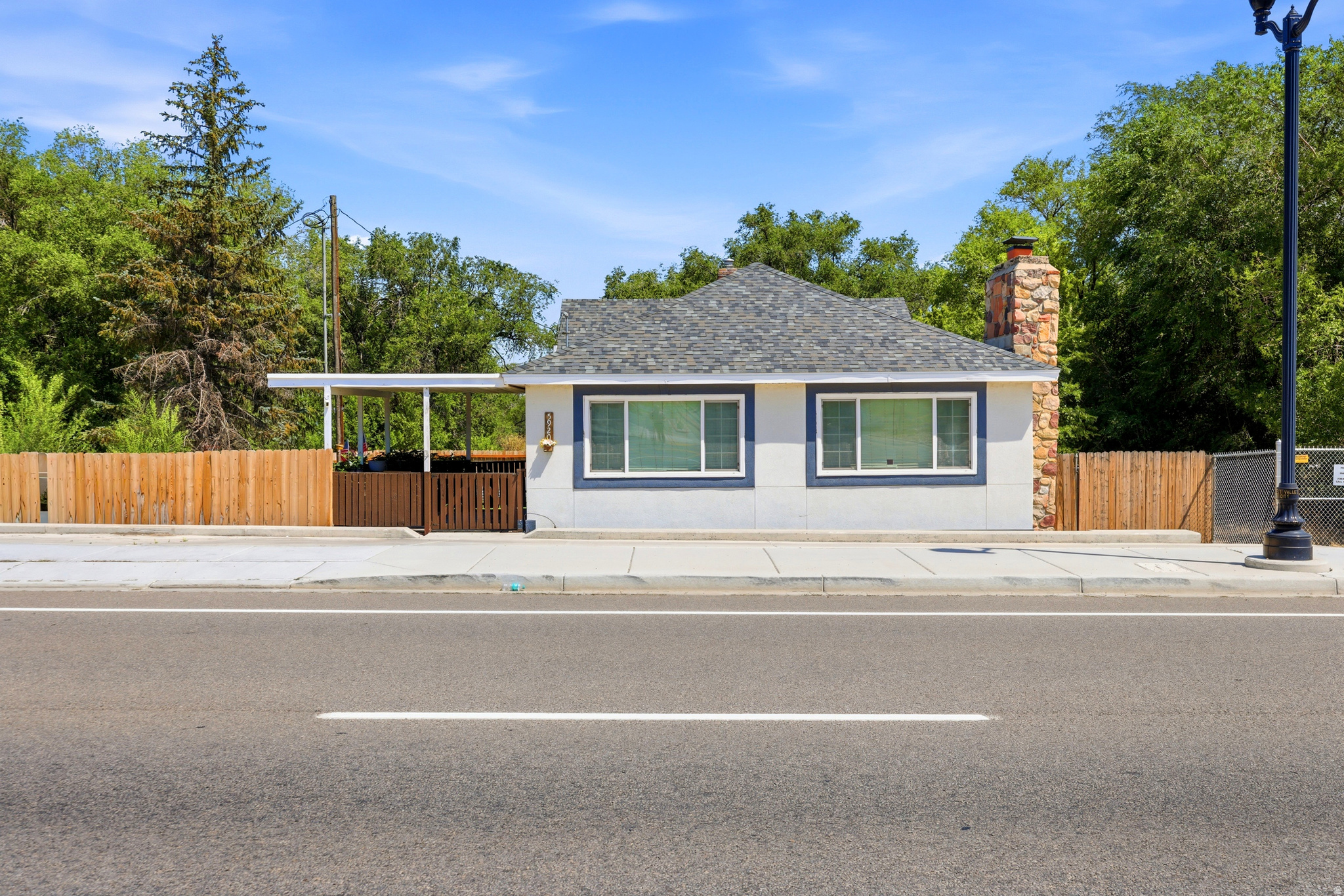 **OPEN HOUSE: Saturday July 25th 10:00am-12:00pm** Roof New 6 years ago, single shingle; UDOT poured new driveway in 2022 driveway is u shaped for easy entrance/exit/easy turnaround, also provides extra parking; no backyard neighbors, huge (2.82 acre lot unoccupied  by owner who wanted to do commercial but is 8 ft short of requirement and interested in selling the lot) stucco done 2020, dog run fully fenced in with large door access, interior painted 2020, entire fence replaced 2025, new oven 2025, new dishwasher 2025, new disposal 2025, new water heater 2022 air ducts cleaned and sanitized 2022, active radon system serviced in 2020, gas fireplace serviced 2022, new tiled shower downstairs 2023, firepit in backyard, build in basketball hoop, freshly painted decks 2026.    Square footage figures are provided as a courtesy estimate only.  Buyer is advised to obtain an independent measurement.