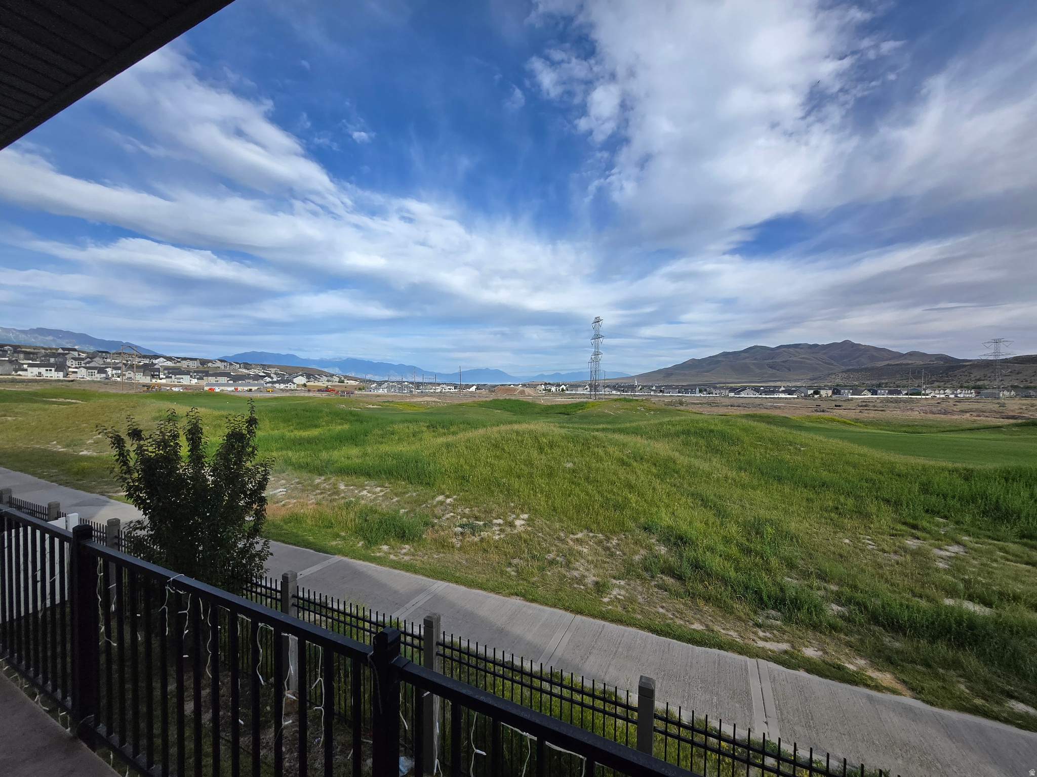 Note GPS says Cypress Alley. Stunning views will amaze you from front deck. On Hole #7 of Ranches Golf Course. This former model home features many upgrades including soft close cabinets, upgraded electrical and plumbing fixtures, and granite countertops throughout. Very Private entrance to front door and garage. This property is a MUST SEE and buyers will not be disappointed! The Open Floor plan is perfect for families and for entertaining! Grand Master Suite with soaking tub and massive closet on main floor as well as a large 2nd BR. Downstairs has 2 large bedrooms, full bath, walkout to backyard & golf course. Full theatre room under garage with upgraded wiring and lighting! Easily could be mother-in-law quarters. Across from neighborhood park. Square footage figures are provided as a courtesy estimate only and were obtained from county records.  Buyer is advised to obtain an independent measurement.