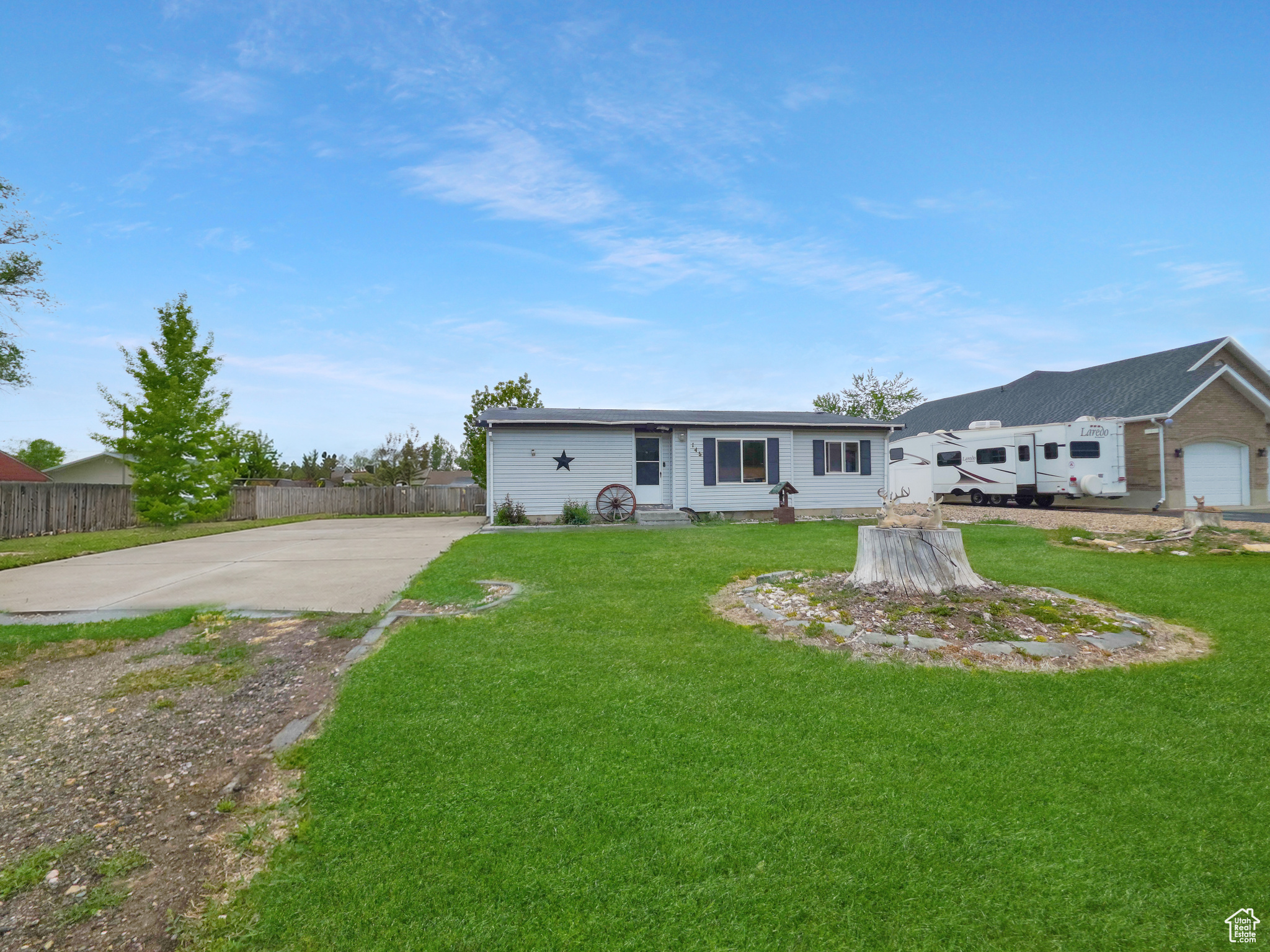 Hard-to-find country flexibility with move-in-ready comfort. Situated on a spacious .36-acre lot in Levan, this 3-bedroom, 2-bath manufactured home offers single-level living, mountain views, room to breathe, and the freedom to keep animals with no HOA. Buyers looking for usable land and practical upside will immediately recognize the value here: horse property, RV parking, two storage sheds, mature trees, vegetable garden space, and ample room to add a shop or create the setup they have been wanting. Inside, vaulted ceilings and a functional layout make the home feel open and inviting, while the primary bedroom includes its own bath and walk-in closet. Major updates already add confidence, including a BRAND-NEW 30-year architectural ROOF and a newer furnace installed within the last 3 years. If you have been searching for an affordable property with elbow room, utility, and future potential, this one stands out.