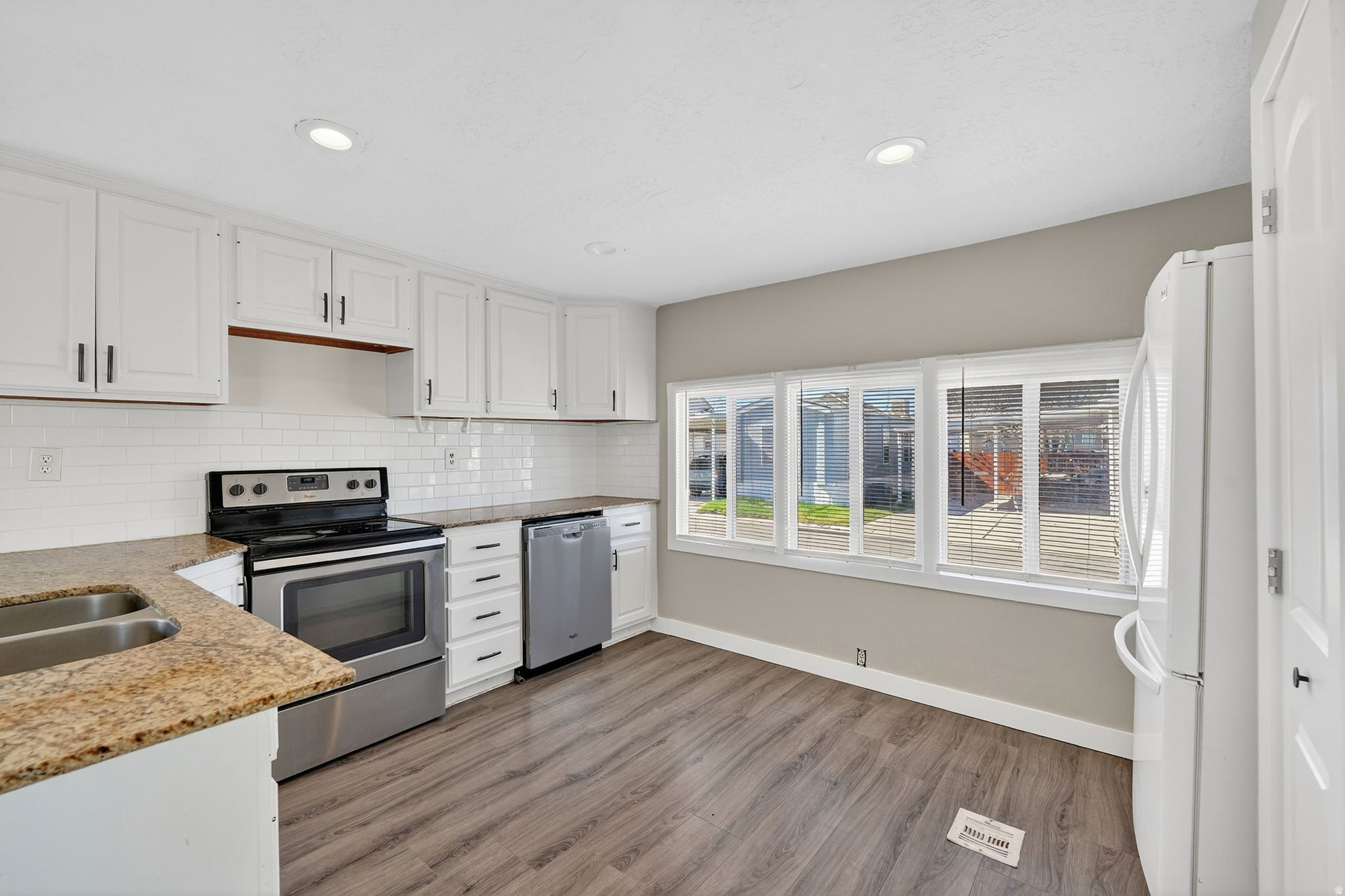 Easy to show! This centrally located property in West Valley offers convenient access to nearby restaurants, government offices, and other commercial amenities. It's just 3 minutes from Interstate 15 and 5 minutes from Interstate 215, making commuting quick and easy.  The home has also seen some great updates, including a roof that was replaced 7 years ago and windows that were updated 5 years ago. The property was cleaned in the interior and exterior.