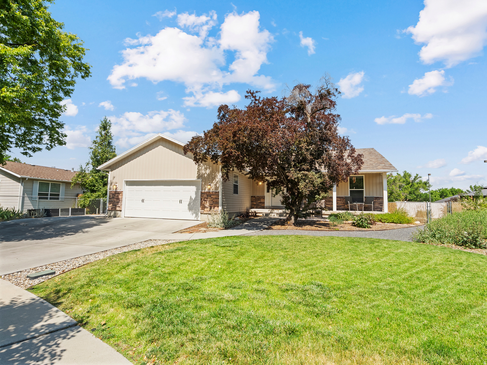 On a tree lined street in a quiet Murray neighborhood this home is move in ready with a mother-in-law (attached ADU), detached 2 car garage / workshop, hobby shed, RV parking, and multiple outdoor living spaces. Backing up to the Jordan River Trail and Walden Park, this home provides recreational opportunities while boasting a number of thoughtful updates - including skylights, new water heater (2023), new roof (2020), and drought tolerant landscaping. The large front room, kitchen, and back porch provide the perfect location for hosting get togethers. The basement has a spacious family room and potential 5th bedroom with lots of storage. Schedule a tour today!