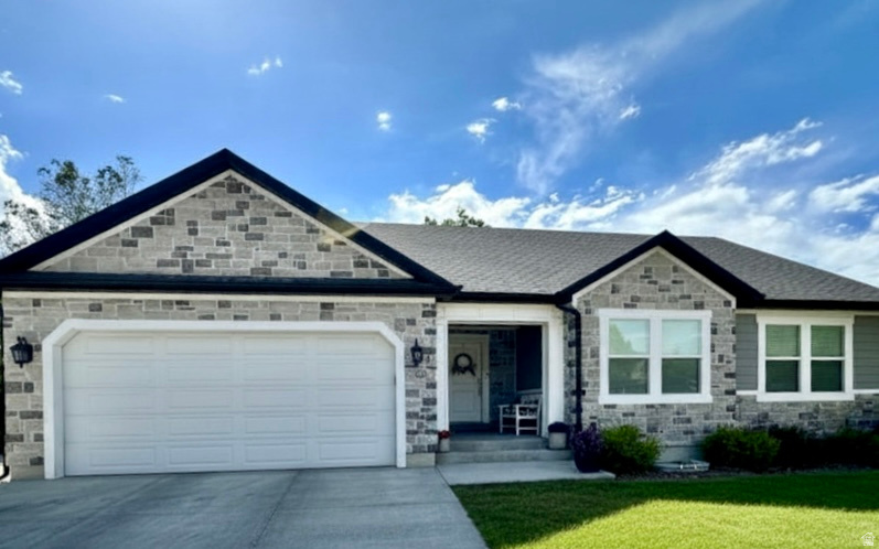 Beautiful & immaculate describes this 6 bedroom home. Open and spacious floor plan. Gas fireplace. Custom white kitchen cabinetry  with solid surface counters, Gas range. Custom white cabinets in laundry room. Large family room in basement. Huge workout room or additional storage area. Covered patio in back yard. RV Parking. You will love this great family home located in the heart of town.