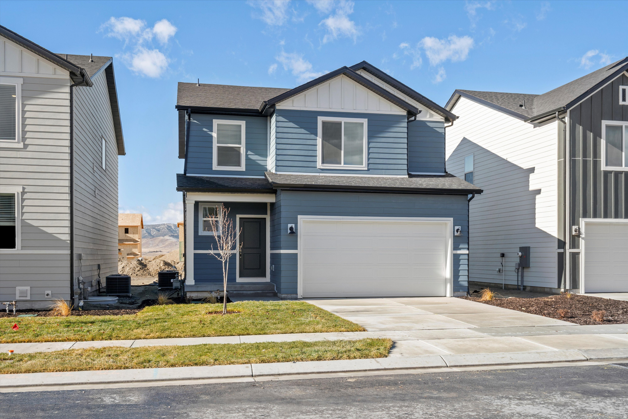 This three bedroom home has an open-concept kitchen and great room perfect for entertaining. The primary bedroom provides a spacious walk-in closet for all your fashion needs. Unfinished basement included. Move in ready with a washer, dryer, fridge and blinds throughout! Total home approx. sq. ft. 2,339.