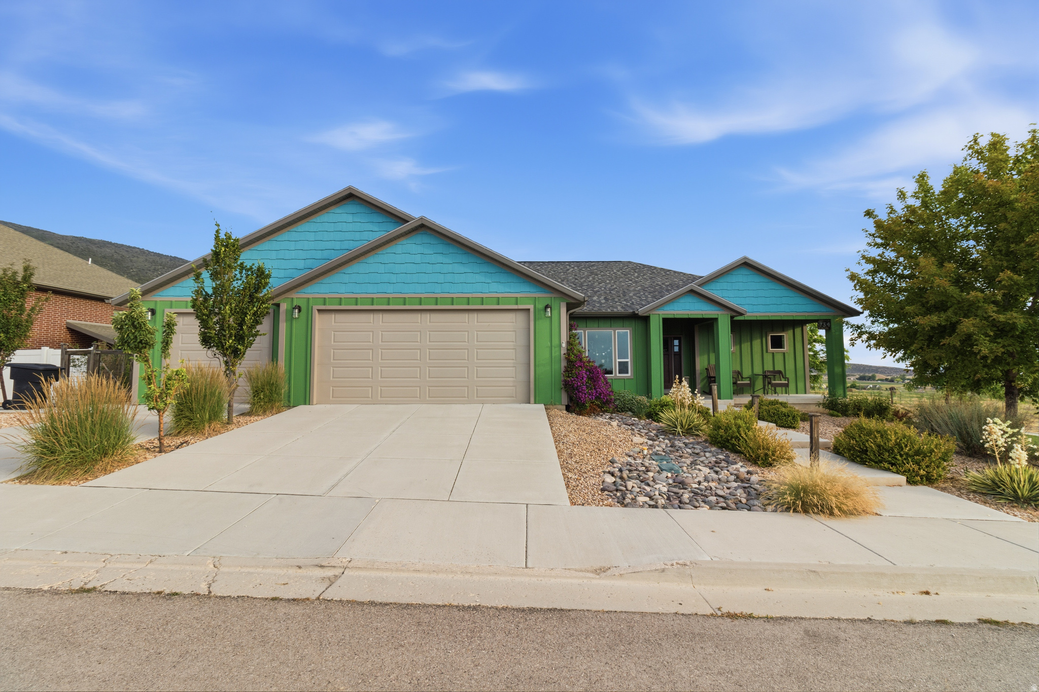 Stunning custom home tucked up Ephraim Canyon in one of the area's most desirable neighborhoods, offering incredible views of both the valley and surrounding mountains. This thoughtfully designed property features 4 bedrooms and 2.5 bathrooms in the main home, plus a fully separate ADU, creating flexibility for a variety of living situations. The main level is designed with accessibility and ease in mind, featuring step-free entry from the garage, wide open living spaces, and a beautifully finished roll-in shower. With a bedroom conveniently located on the main level and three additional bedrooms downstairs, the layout offers both comfort and functionality. No expense has been spared in this high-quality build, with elevated finishes and intentional design throughout that make the home feel both beautiful and practical. The ADU is completely separate with its own garage and entrance, making it ideal for rental income, guests, or multigenerational living. Built beneath the garage with a suspended slab, this space offers excellent privacy while maintaining durability and thoughtful construction. Situated on a fully landscaped, low-maintenance lot, the property also features mature fruit trees including apple, peach, and cherry. Enjoy the peaceful canyon setting, breathtaking views, and the versatility this property has to offer.
