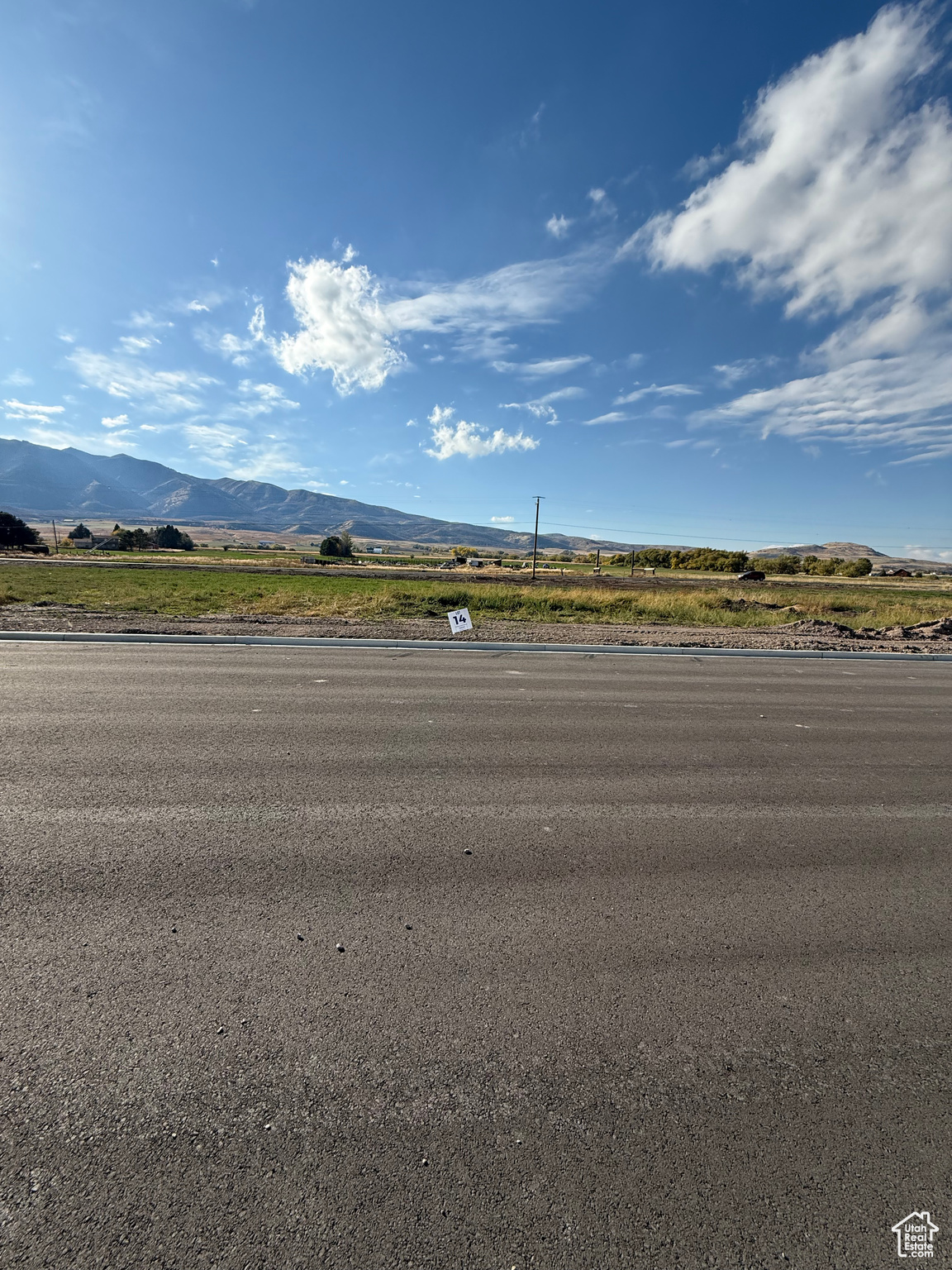 Bring your own Builder! Multiple lots available - Build your dream home in the peaceful and scenic community of Mendon. Blueberry Springs offers spacious 5/8+acre lots with breathtaking views of the mountains and valley. Enjoy paved public roads and full utility access, including Mendon City water, data, power, and secondary water stubbed to each lot. Irrigation water is managed and maintained by the Blueberry Springs HOA. Buyers are responsible for choosing and installing a septic system, subject to approval by Cache County. Each lot includes curb, gutter, and sidewalk frontage. This subdivision allows animal rights in accordance with Mendon City ordinances (https://mendoncityutah.gov). Bring your own builder and design your ideal home while adhering to city setbacks and protective covenants that maintain the neighborhood's appeal.