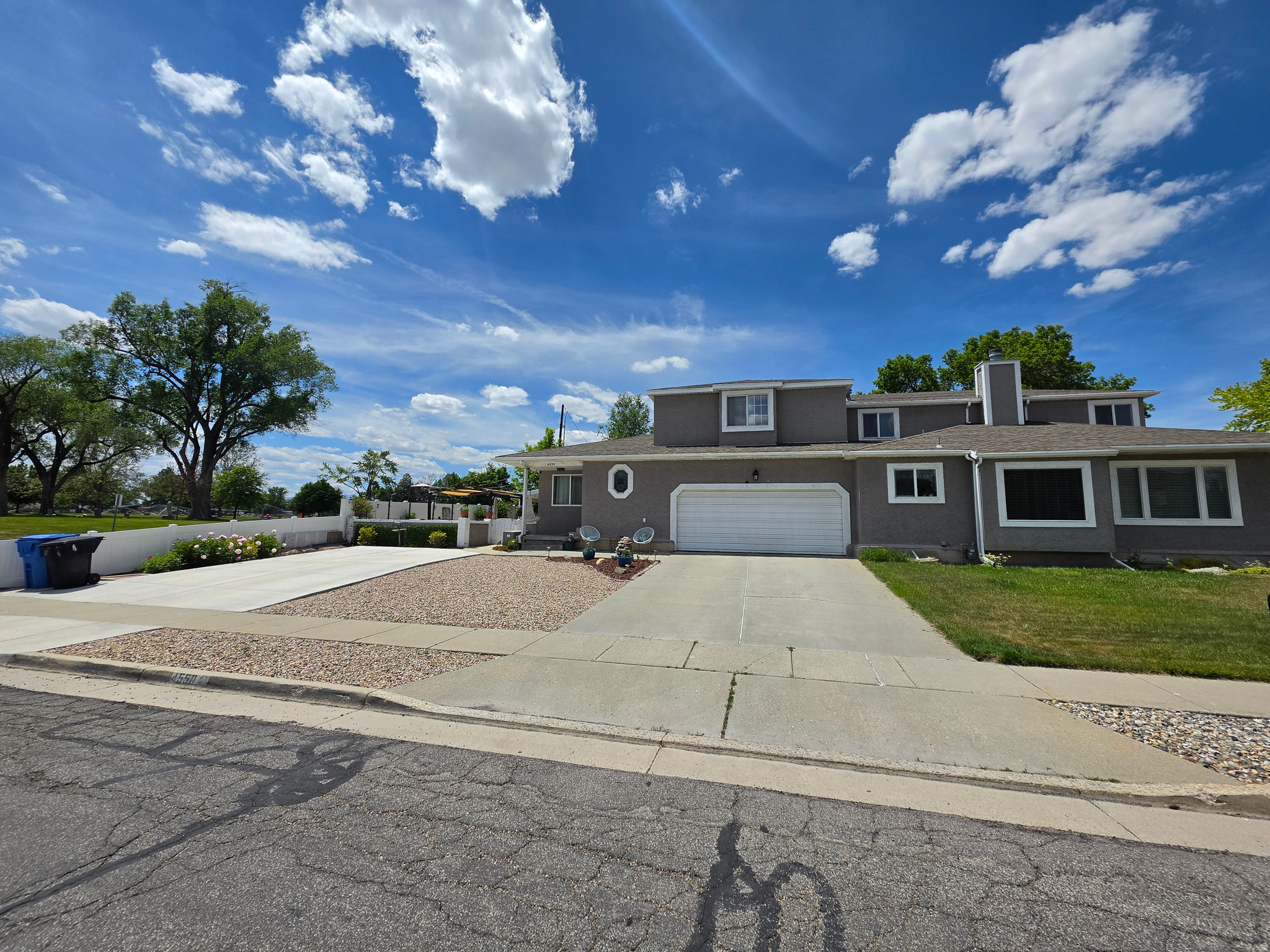Welcome to one of Holladay/Millcreek's most uniquely designed properties - a 5-bedroom, 4-bathroom twin home offering approximately 2,850 square feet of thoughtfully finished living space, ideal for owner-occupants and investors alike. This home was extensively updated throughout and configured for flexibility from the ground up. Beyond the spacious 3-bedroom, 2-bath main living area, the property features two separate 1-bedroom, 1-bath guest suits each with a living area, kitchenette, and private entrance. The result is a layout that functions as three distinct living sections under one roof - perfect for multi-generational living, house-hacking, or generating rental income from one or both suites while you live in the main residence. Additional highlights include a fully xeriscaped yard with covered patio, a 2-car attached garage, dedicated RV parking, and ample off-street parking - all with no HOA fees or restrictions, giving owners complete freedom over how the property is used and managed. Minutes from I-15, I-215, St. Mark's Hospital, premier canyon recreation, and the dining and shopping of Holladay and Millcreek, this is a rare opportunity to own a turnkey property built for flexibility, privacy, and income potential. Homes with this level of adaptability and usable living space seldom come available in this area - schedule your private tour today.