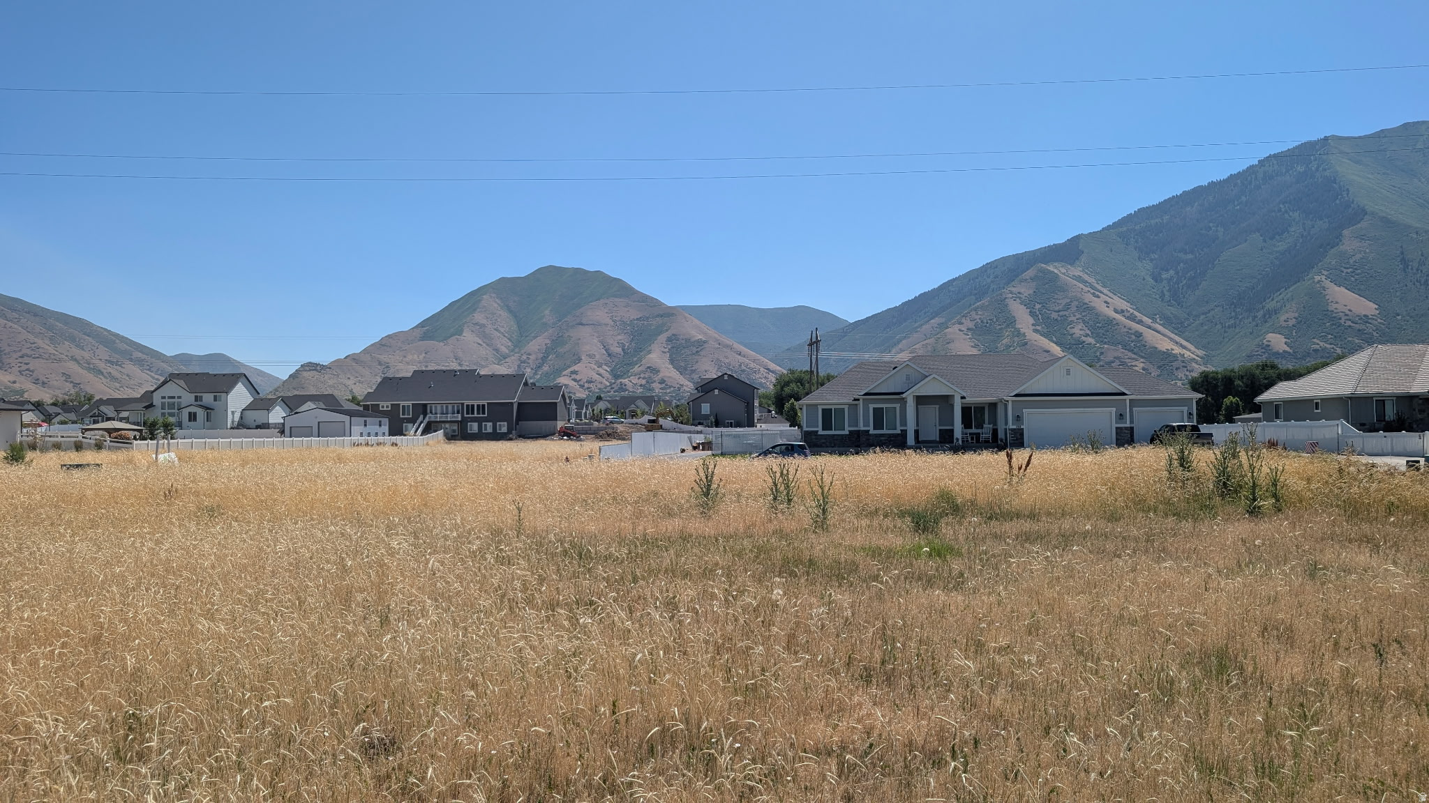 Rare opportunity to build your dream home on this premium 1-acre fully improved lot in the desirable Bentley Brook subdivision in Mapleton. Surrounded by newer custom homes and recent development, this ready-to-build property offers breathtaking mountain views and the peaceful country atmosphere Mapleton is known for.  Zoned with animal rights, this horse property provides plenty of room for horses, livestock, and outdoor living. The lot allows for a basement and all utilities have already been stubbed to the property, making it ready for immediate construction. Sidewalk improvements have already been bonded with the city, saving future expense and delay.  Enjoy the flexibility of country living without the burden of an HOA or restrictive covenants. Pressurized irrigation is planned for the area, adding future convenience and value.  Property Features:  Premium 1-acre fully improved lot  Located in the sought-after Bentley Brook subdivision  Horse property with animal rights  Basement permitted  All utilities stubbed to the lot  Sidewalk improvements already bonded with the city  No HOA or restrictive covenants  Pressurized irrigation planned  Surrounded by newer custom homes and recent development  Spectacular panoramic mountain views  Ready to build  Bring your own builder and create the custom home you've been dreaming of in one of Utah County's most desirable communities, with the perfect combination of rural living and convenient access to schools, shopping, and recreation.