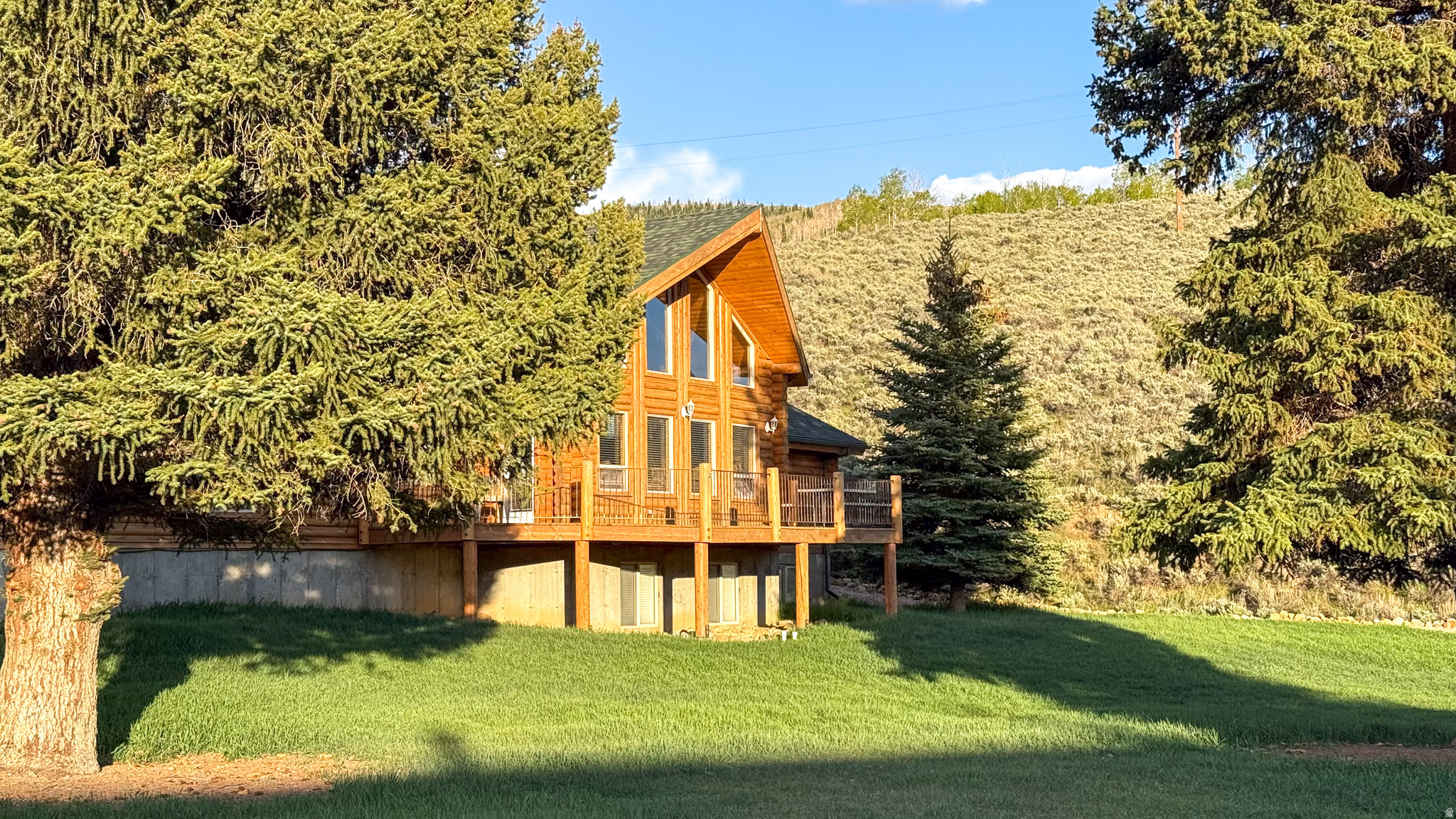 Nestled in the historic mining town of Scofield, this custom multibedroom cabin delivers sweeping views of Winter Quarters Canyon and exceptional outdoor living. Built for gatherings, the spacious kitchen features a commercialgrade grill, perfect for hearty mountain breakfasts, and flows to generous living areas designed for comfort and connection. Sold fully furnished, the property is turnkey and ready for immediate use. Outside, enjoy a large manicured lawn, a dedicated playground area, and abundant space for recreation and relaxation in the crisp mountain air. Whether a seasonal retreat or yearround home, this distinctive cabin offers a rare combination of privacy, views, and readytouse amenities. Schedule your showing today. Square footage figures are provided as a courtesy estimate only. Buyer is advised to obtain an independent measurement.